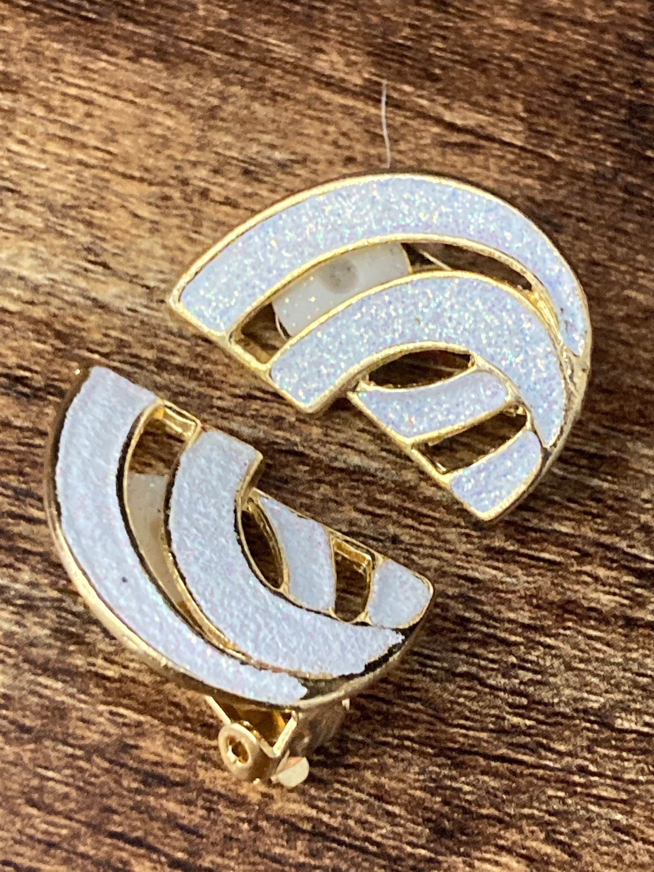 Vintage 1980s large gold tone abstract white glitter clip on earrings
