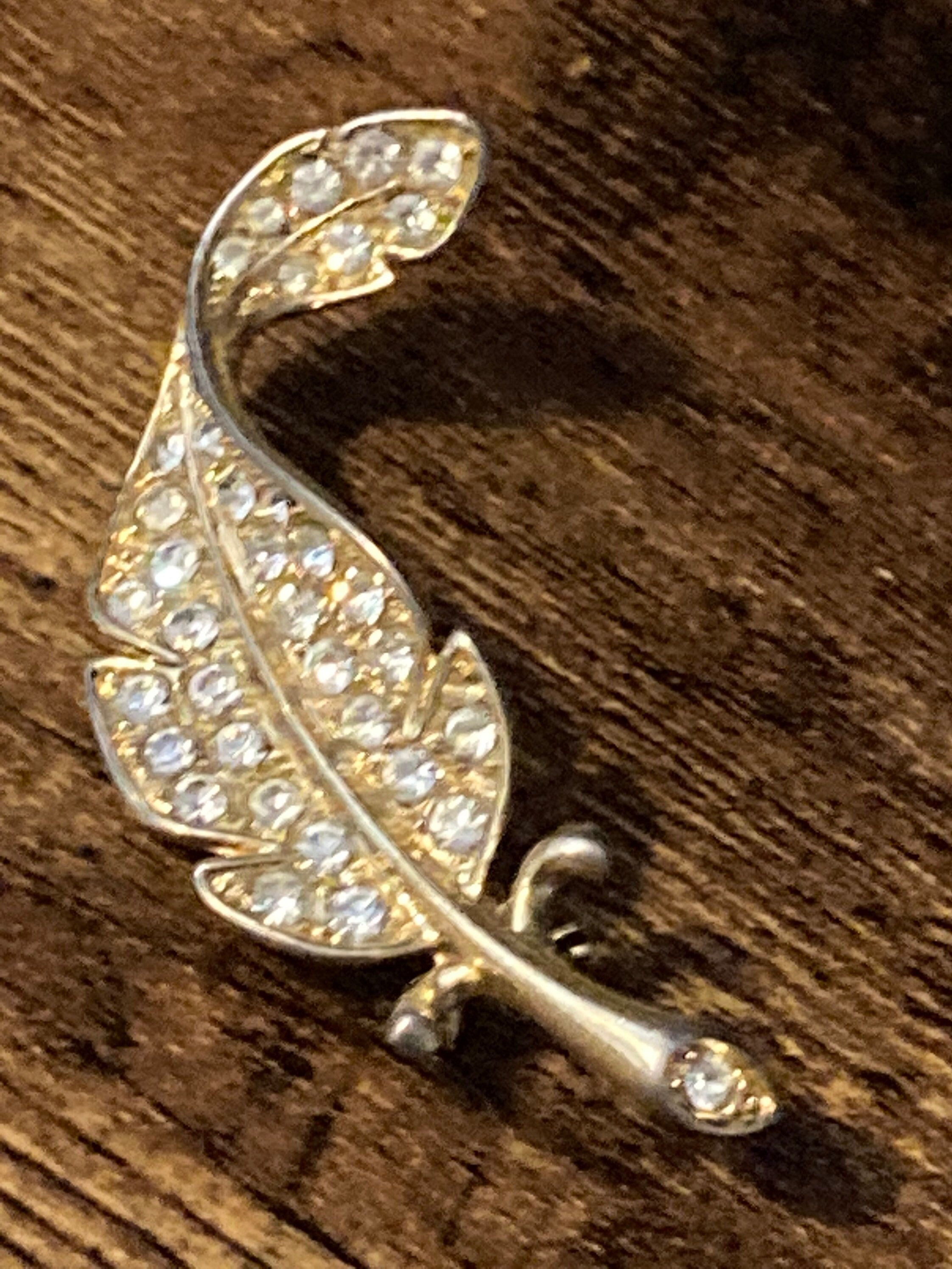 BJ signed clear rhinestone leaf brooch gold tone 1970s 1960s