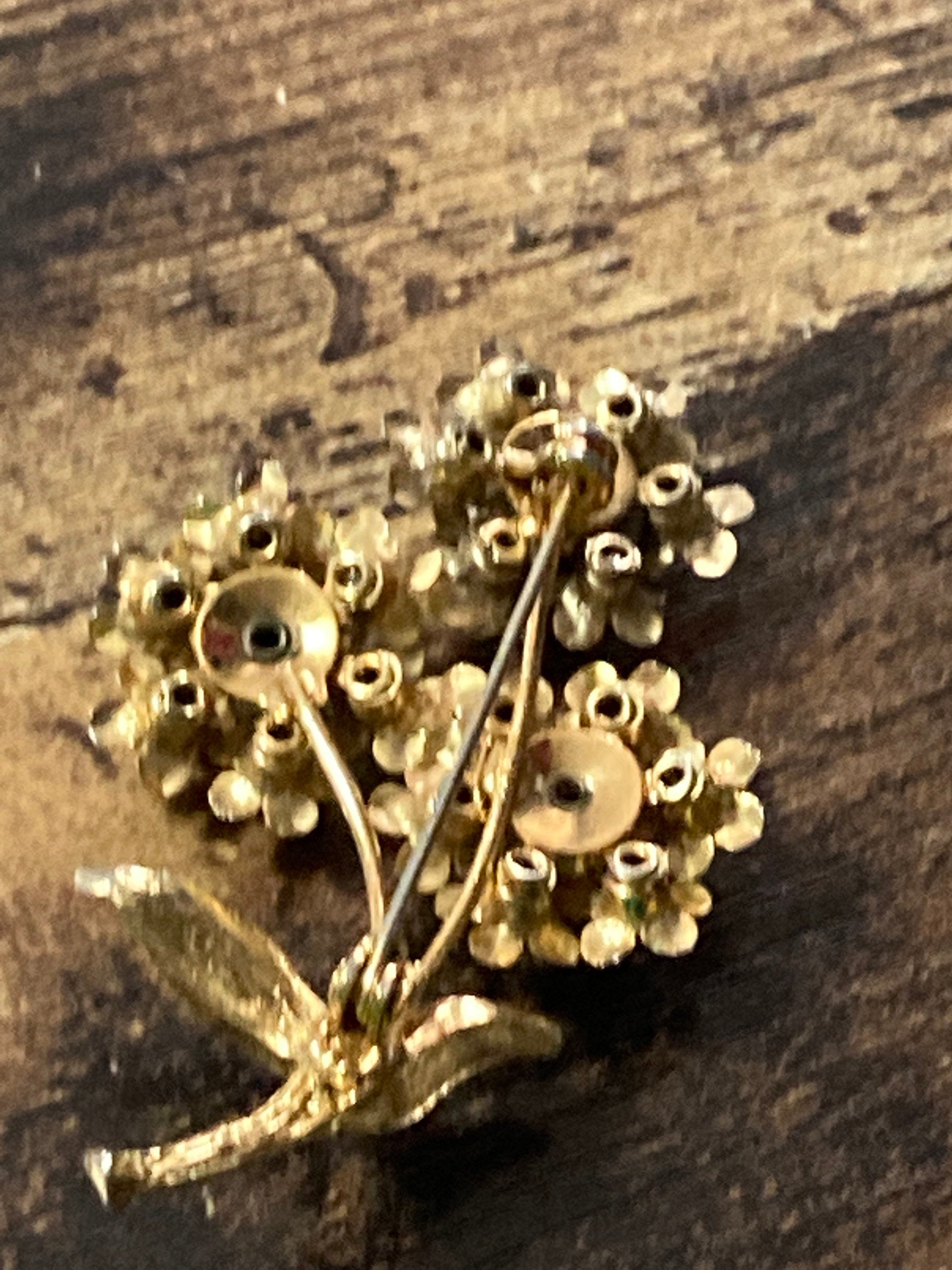 Vintage Aurora Borealis Rhinestone Flower Brooch: Gold Tone Enamel Leaves