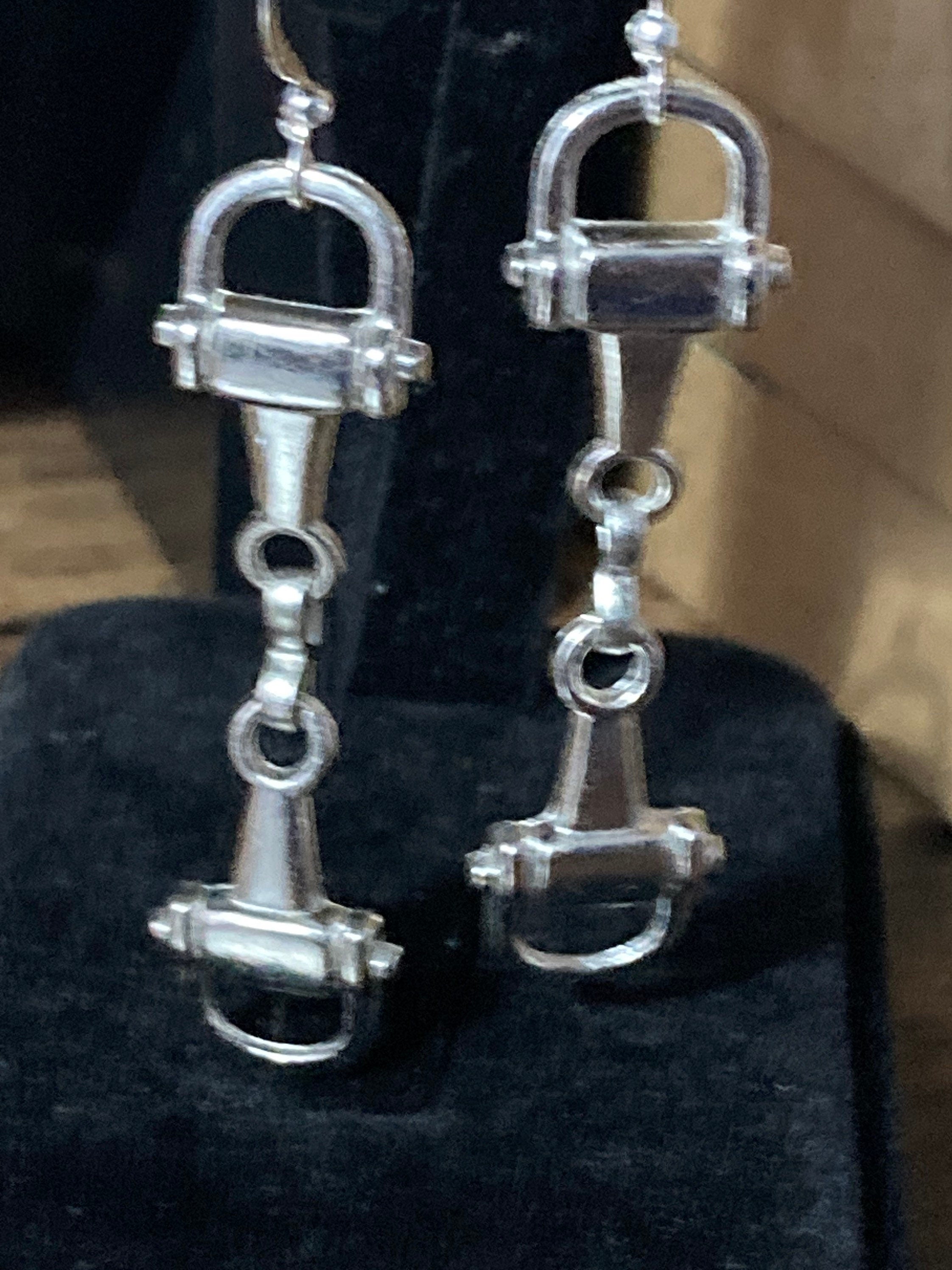 Pair of silver tone snaffle stirrup link 6cm drop earrings
