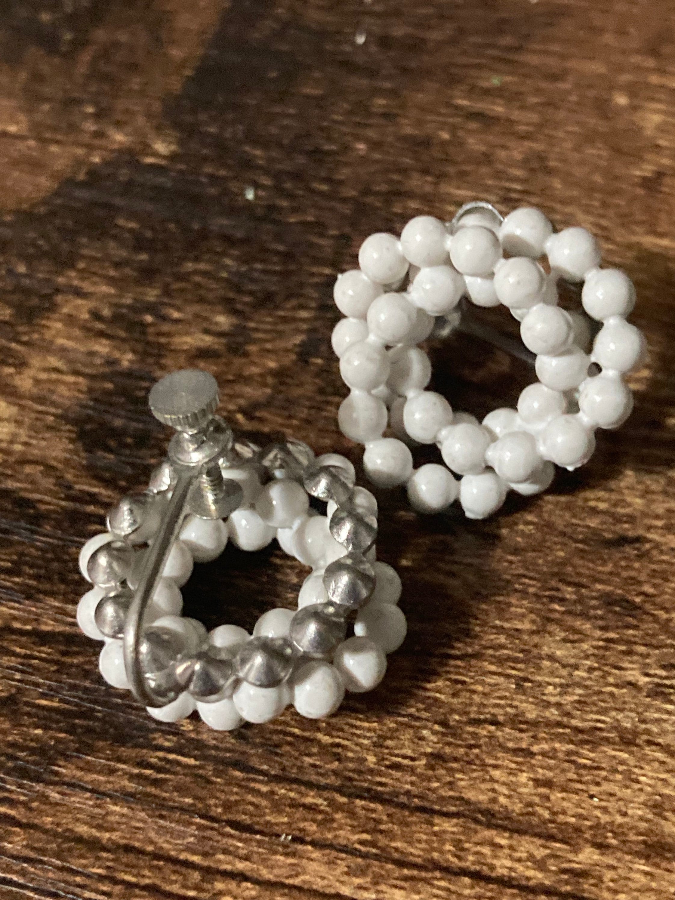white enamel round vintage clip on earrings mid century