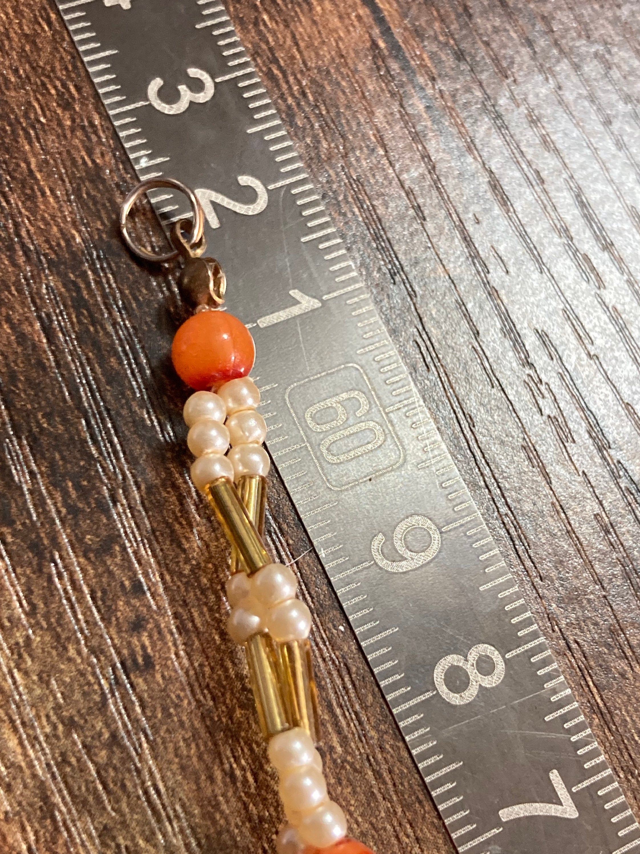 gold tone faux Pearl orange plastic beaded mid length link station necklace 62cm long