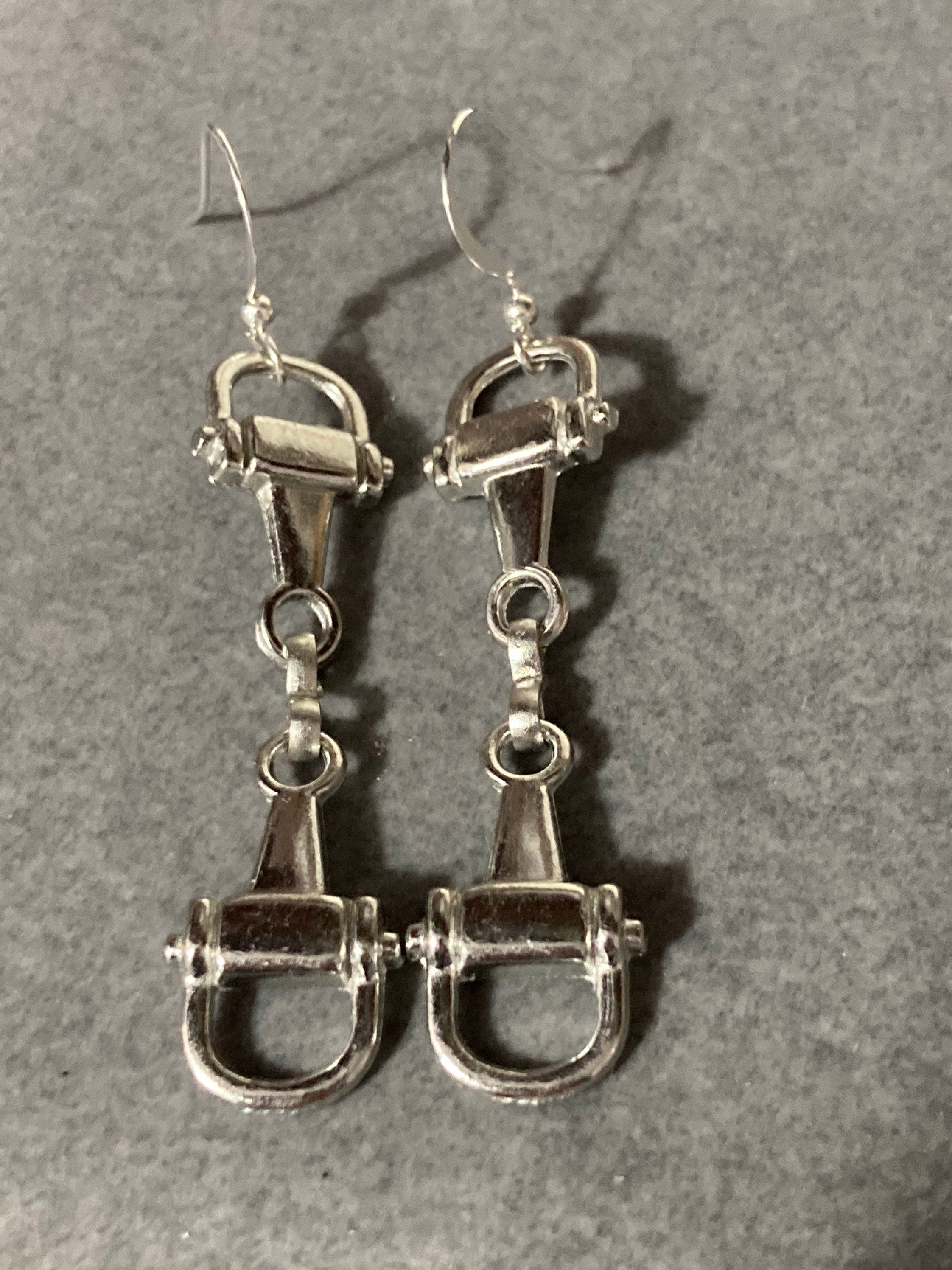 Pair of silver tone snaffle stirrup link 6cm drop earrings