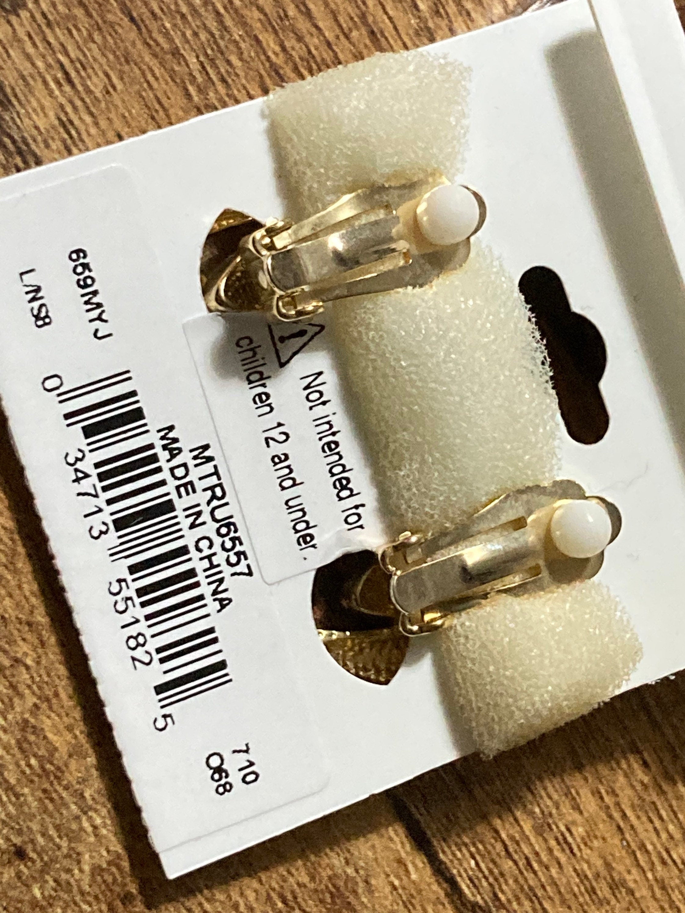 Trifari 1980s gold tone clip on earrings door knocker unsigned