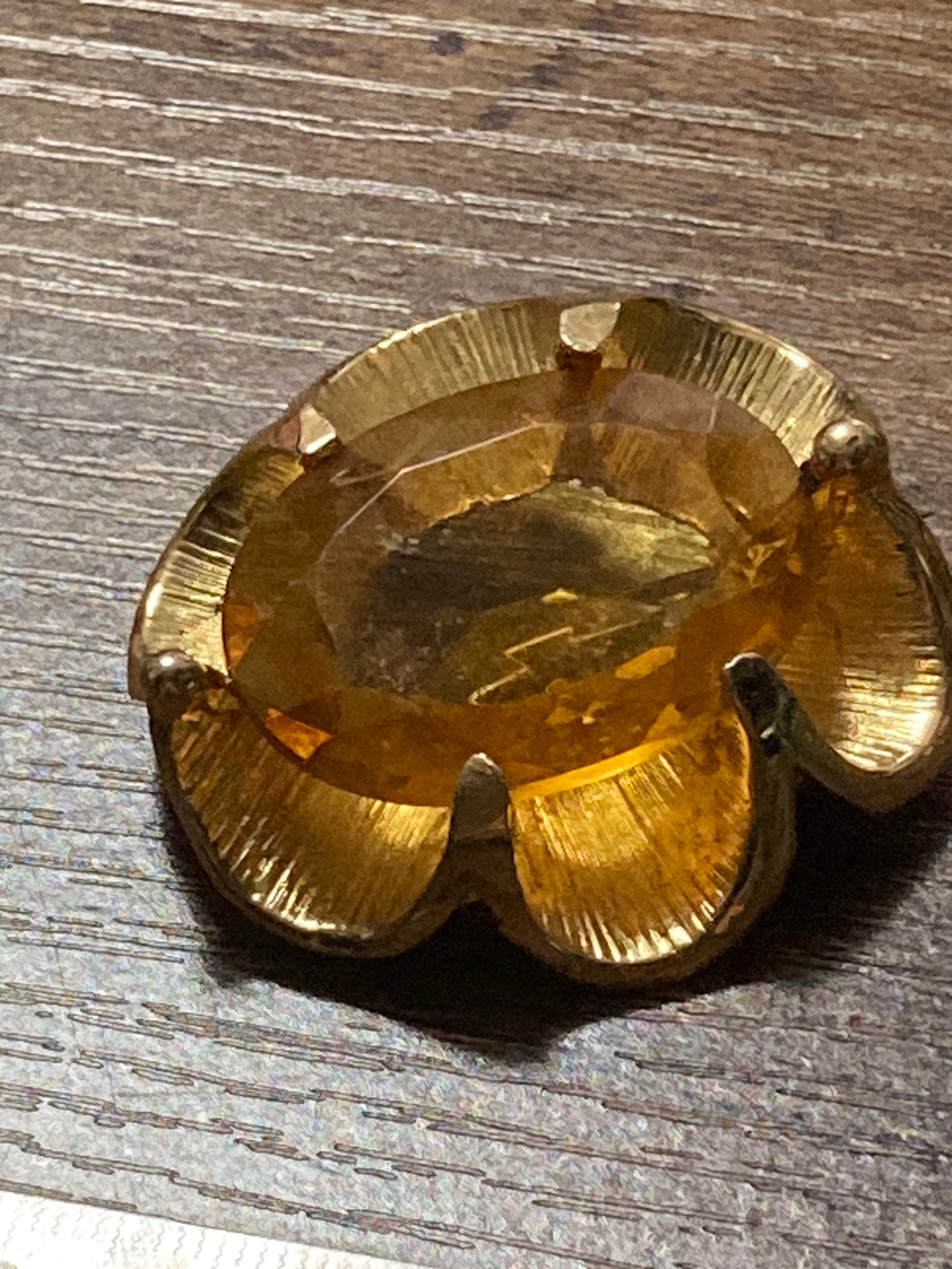 Vintage oversized chunky gold tone brooch with large orange citrine glass cabochon