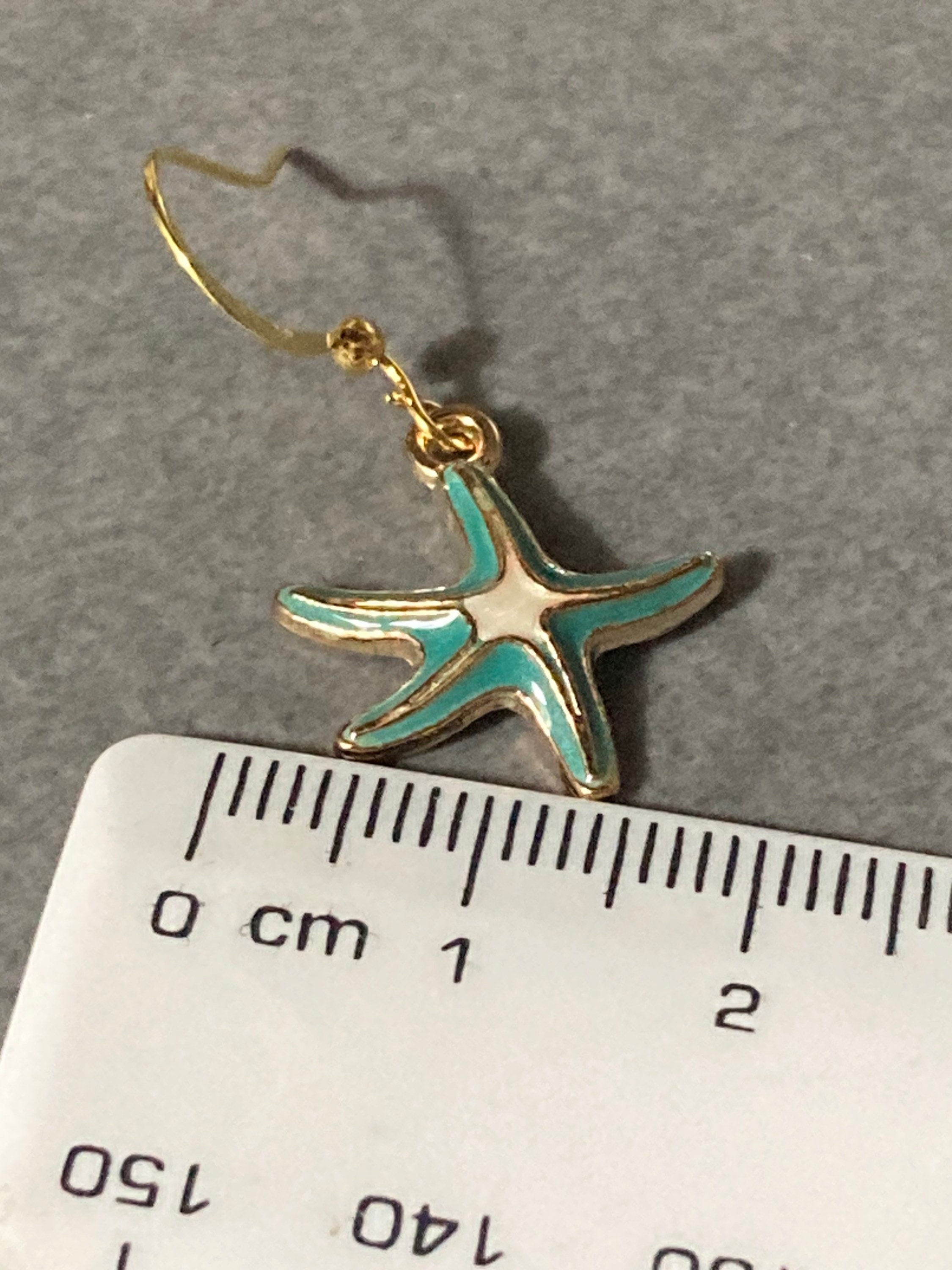 Nautical gold tone white blue enamel starfish drop earrings pierced ears