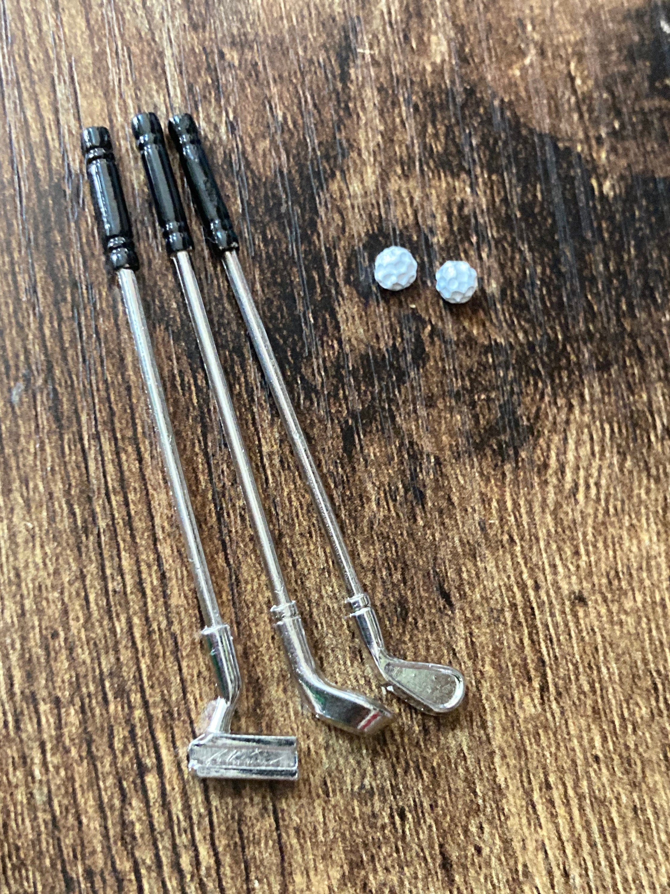Miniature set of three golf clubs and two balls cake topper decoration or dollhouse