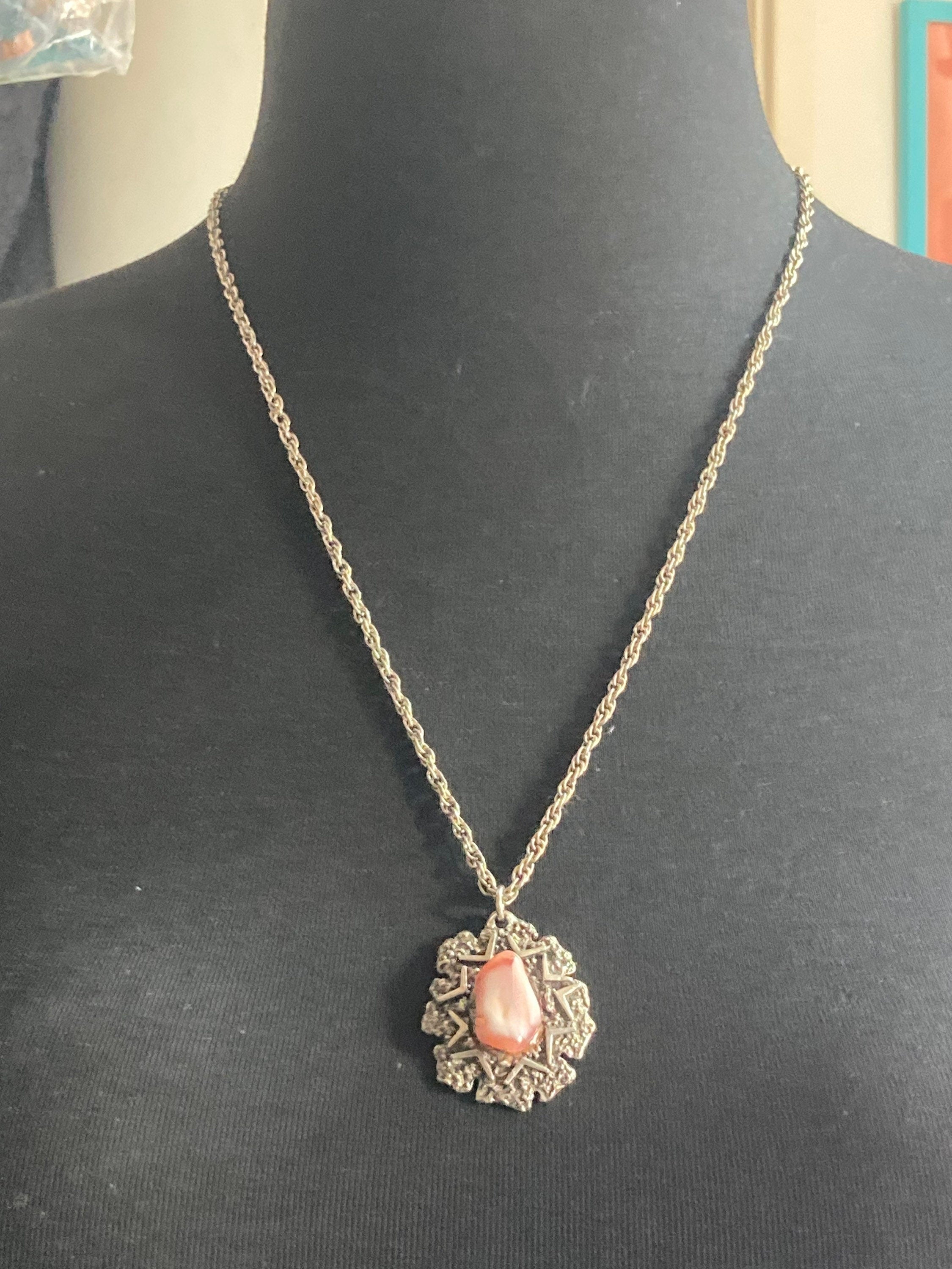 Vintage 1970s brutalist steel pendant pink stone on silver tone chain