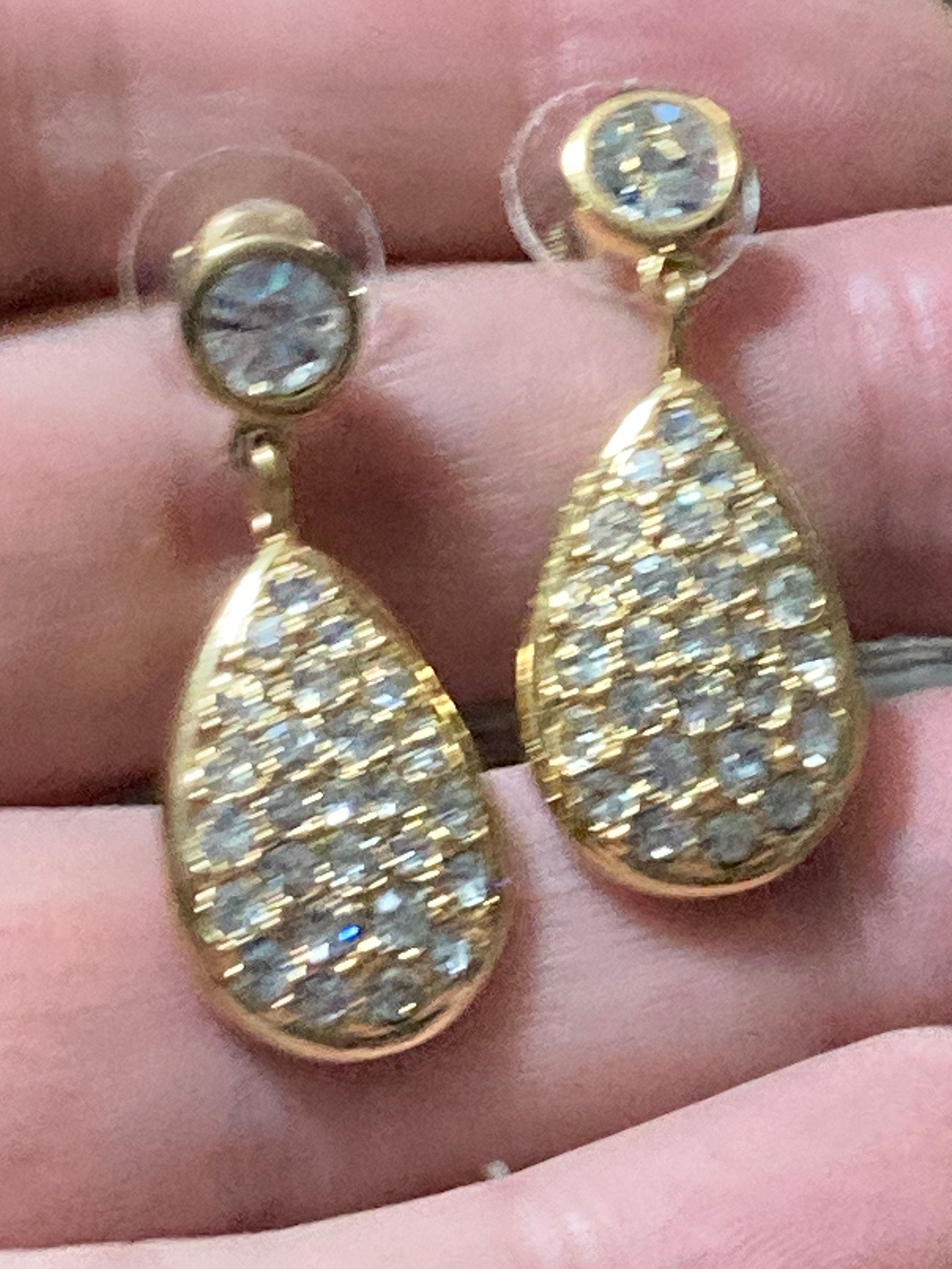 Signed Swarovski crystal gold tone diamanté clear long drop earrings