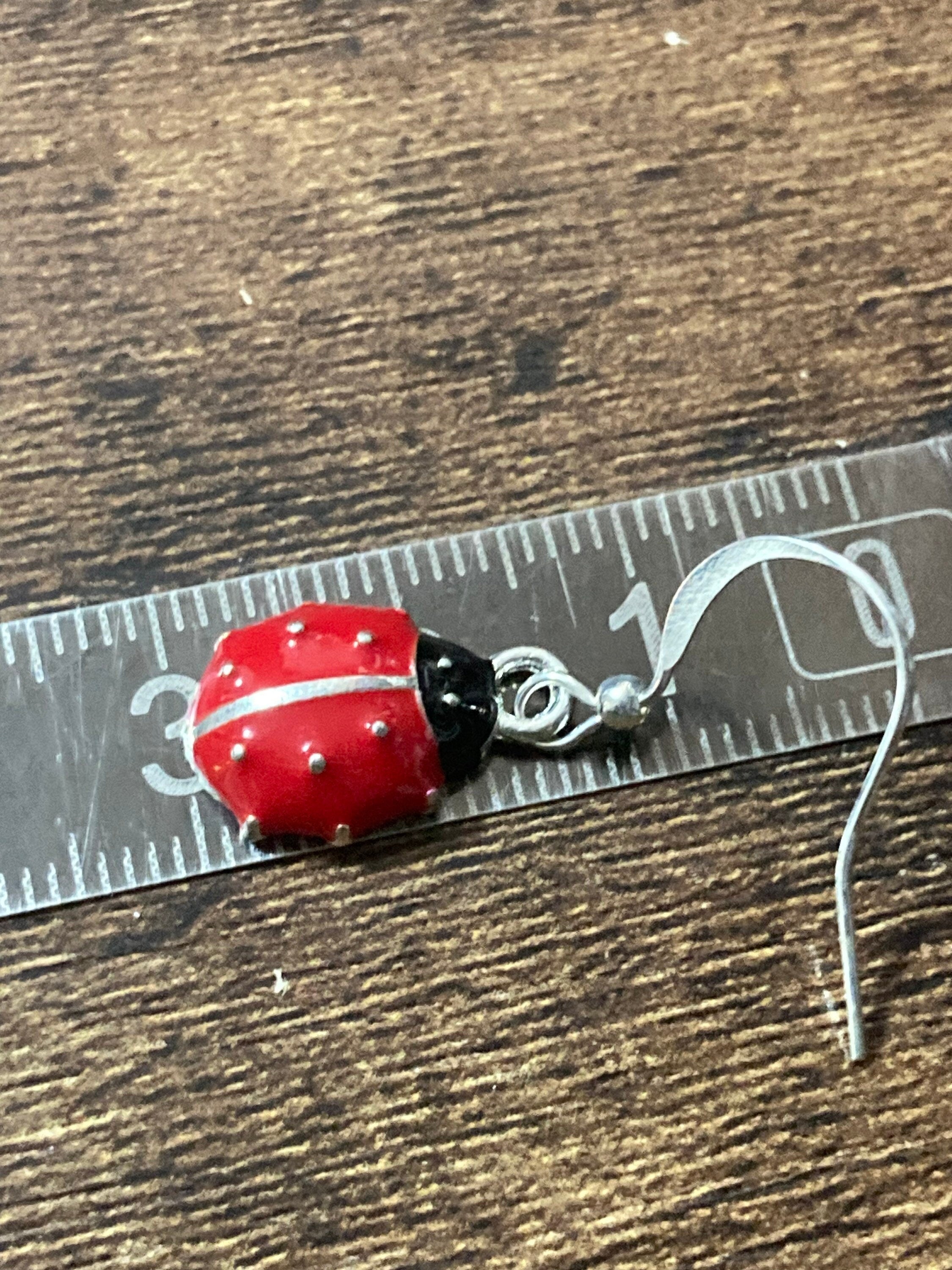 Silver tone black and red enamel ladybird drop earrings for girls