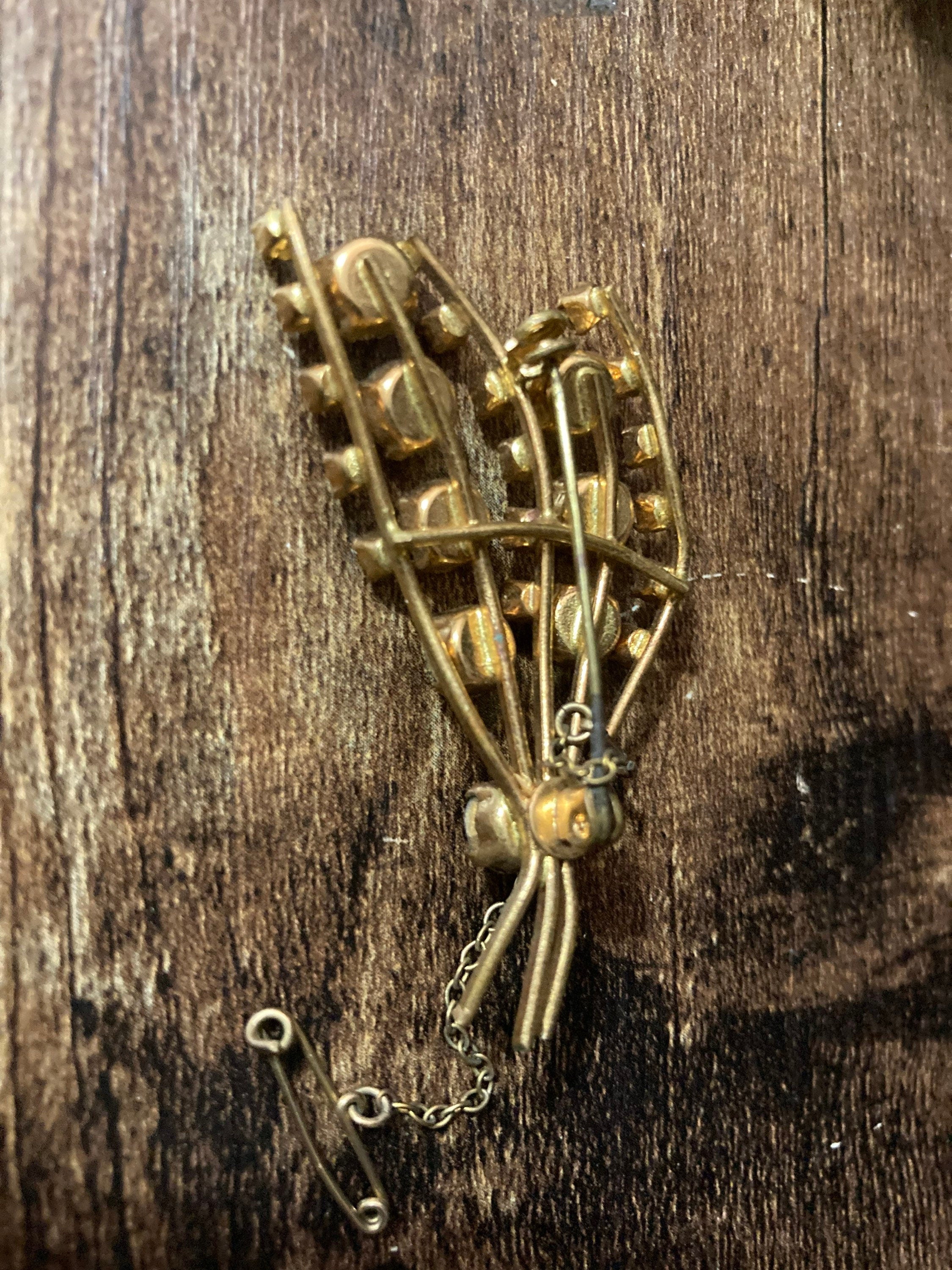 ornate Czech gold tone brass clear rhinestone diamanté leaf brooch