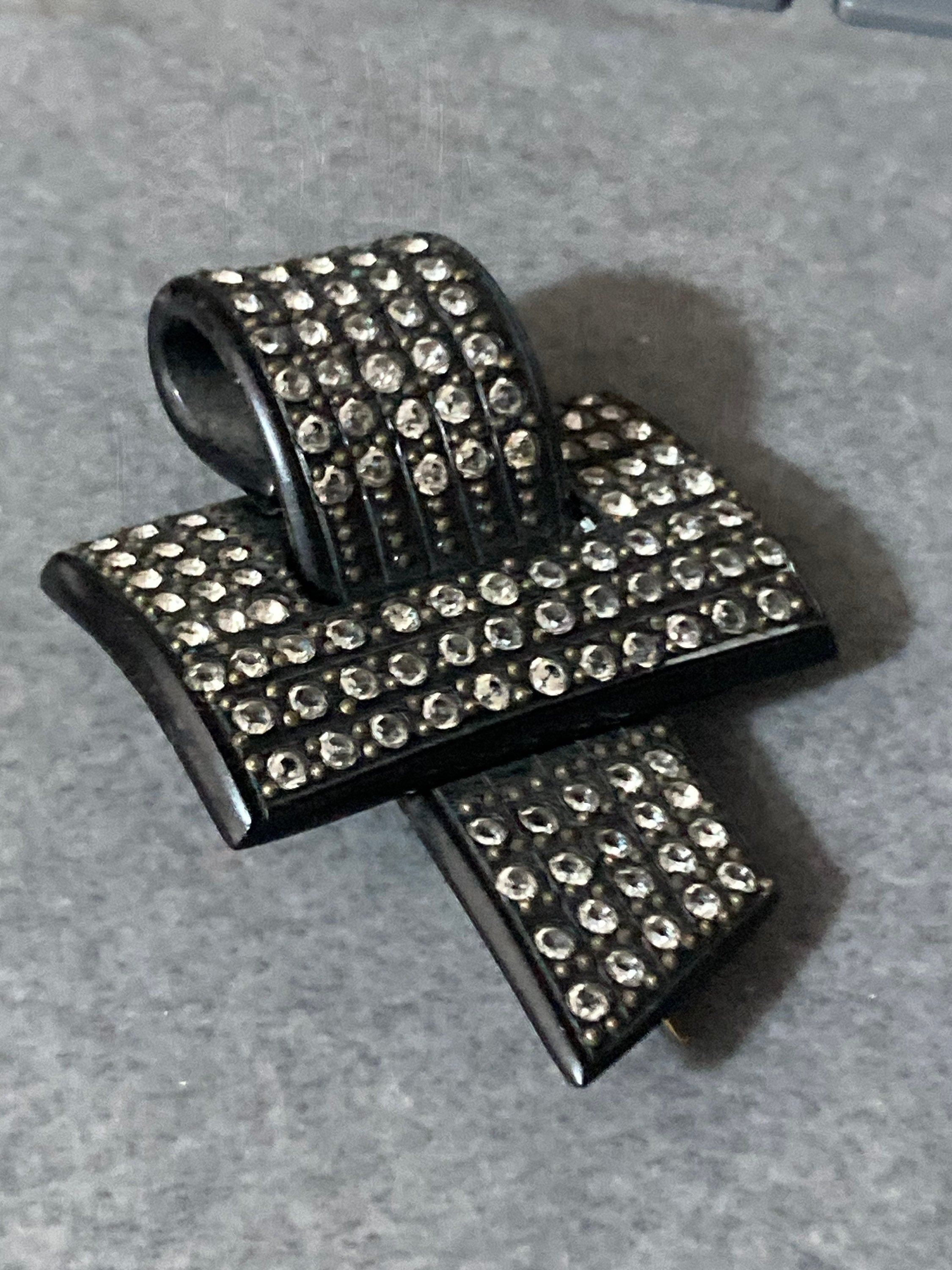 Art Deco hat flash pin diamante paste rhinestone early plastic or bakelite