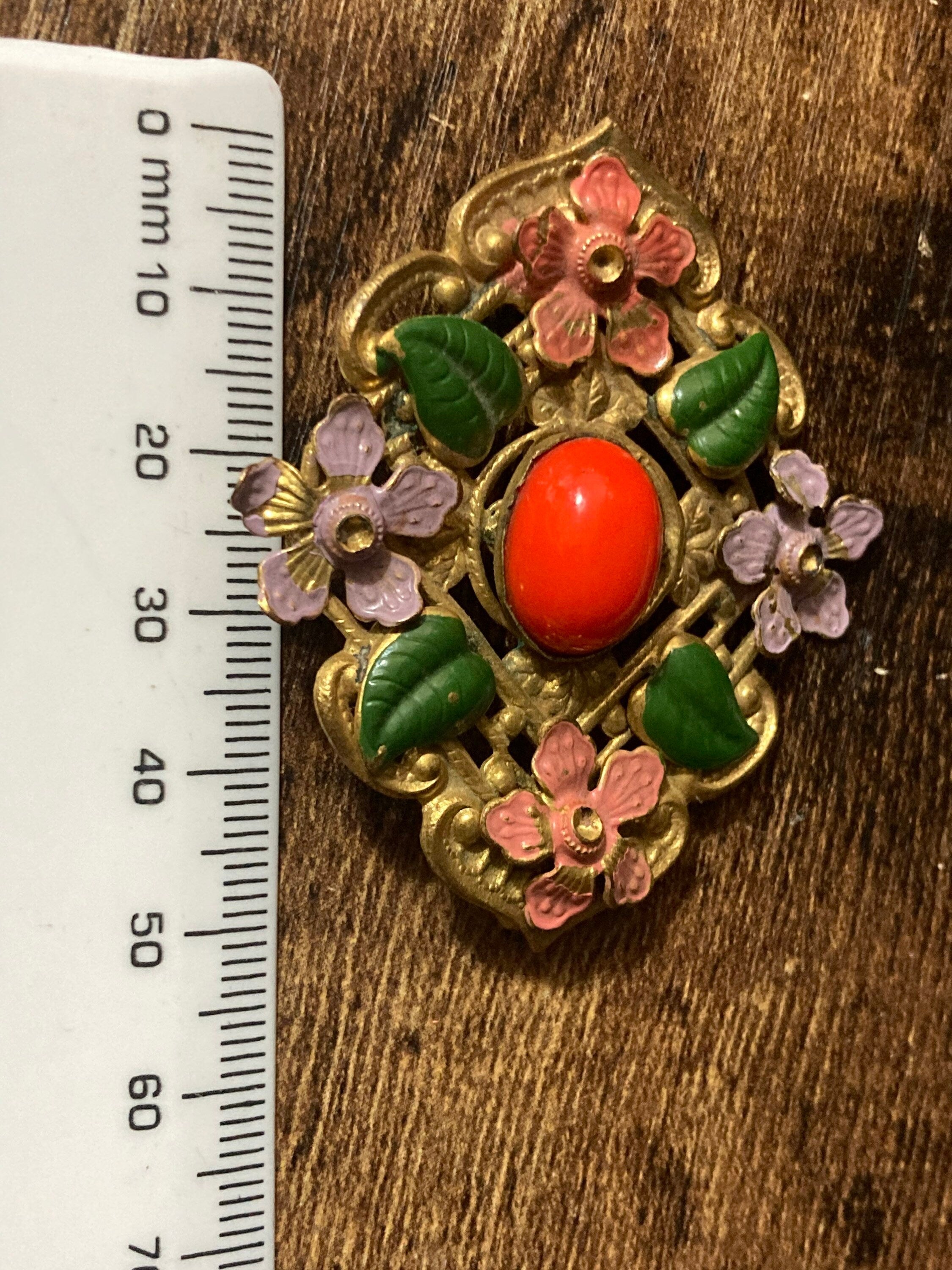 Art Deco Czech brass metal leaf cold painted enamel brooch with faux orange coral glass cabochon