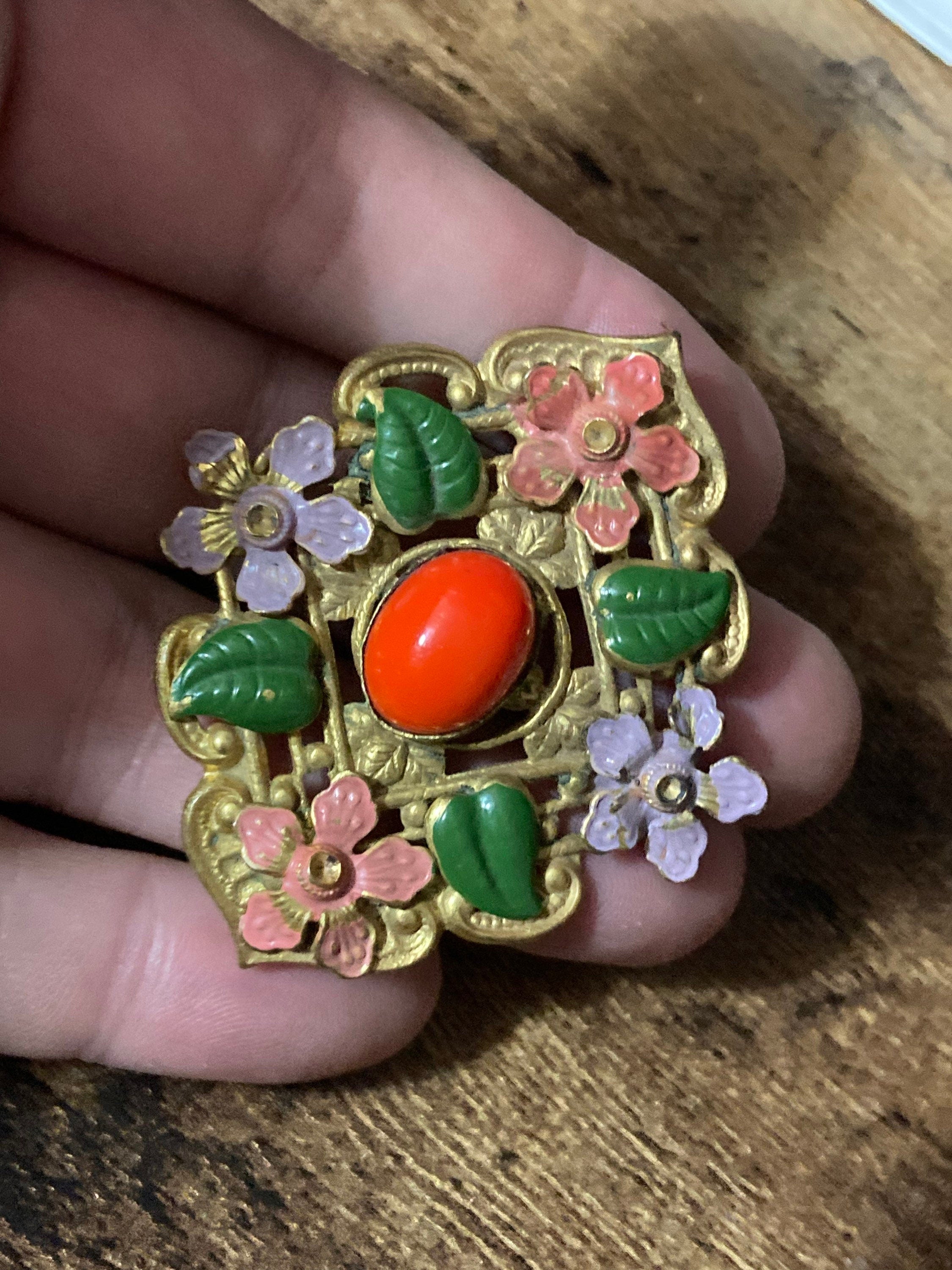 Art Deco Czech brass metal leaf cold painted enamel brooch with faux orange coral glass cabochon