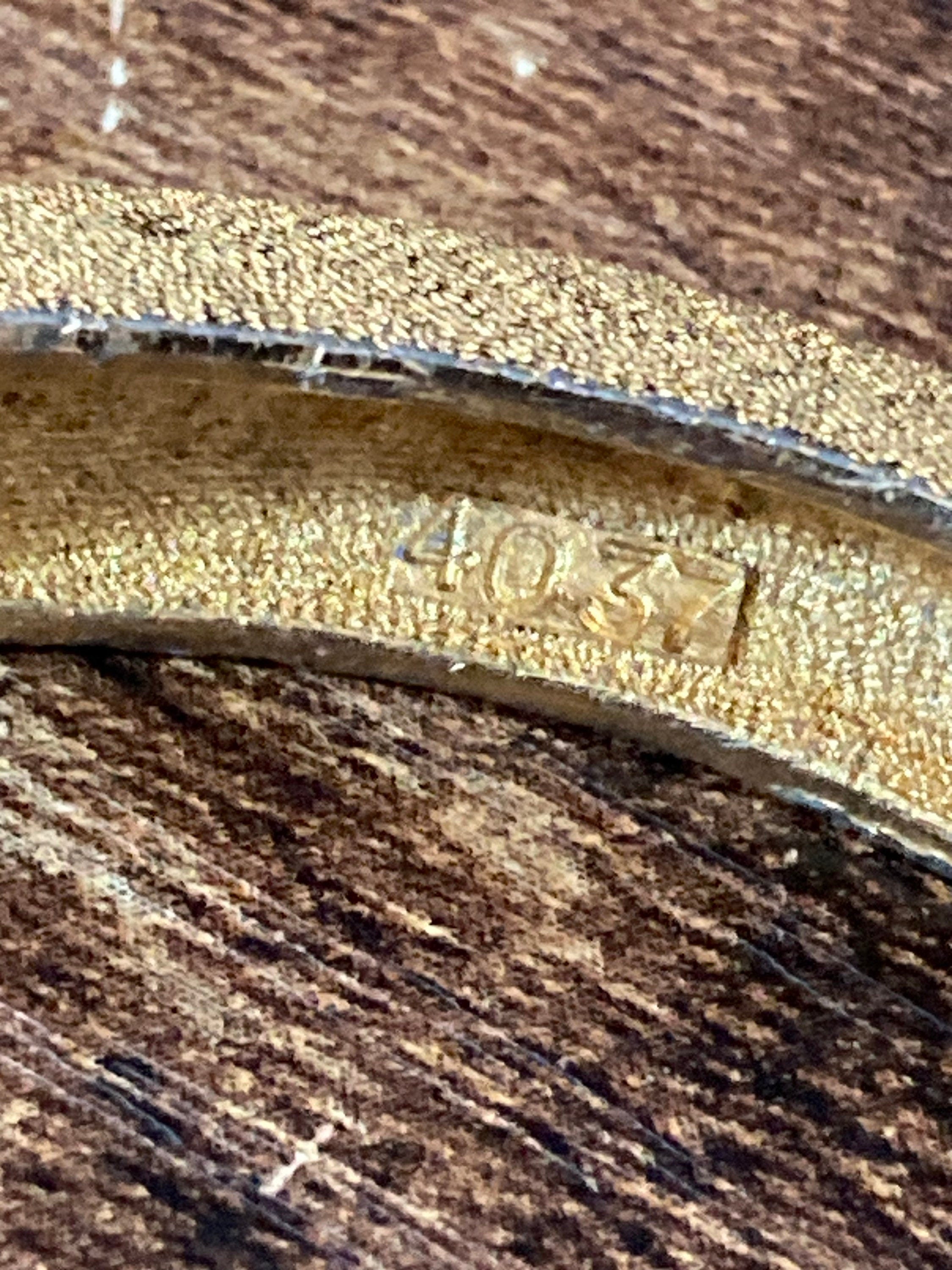 gold and silver tone etched clamper bangle bracelet