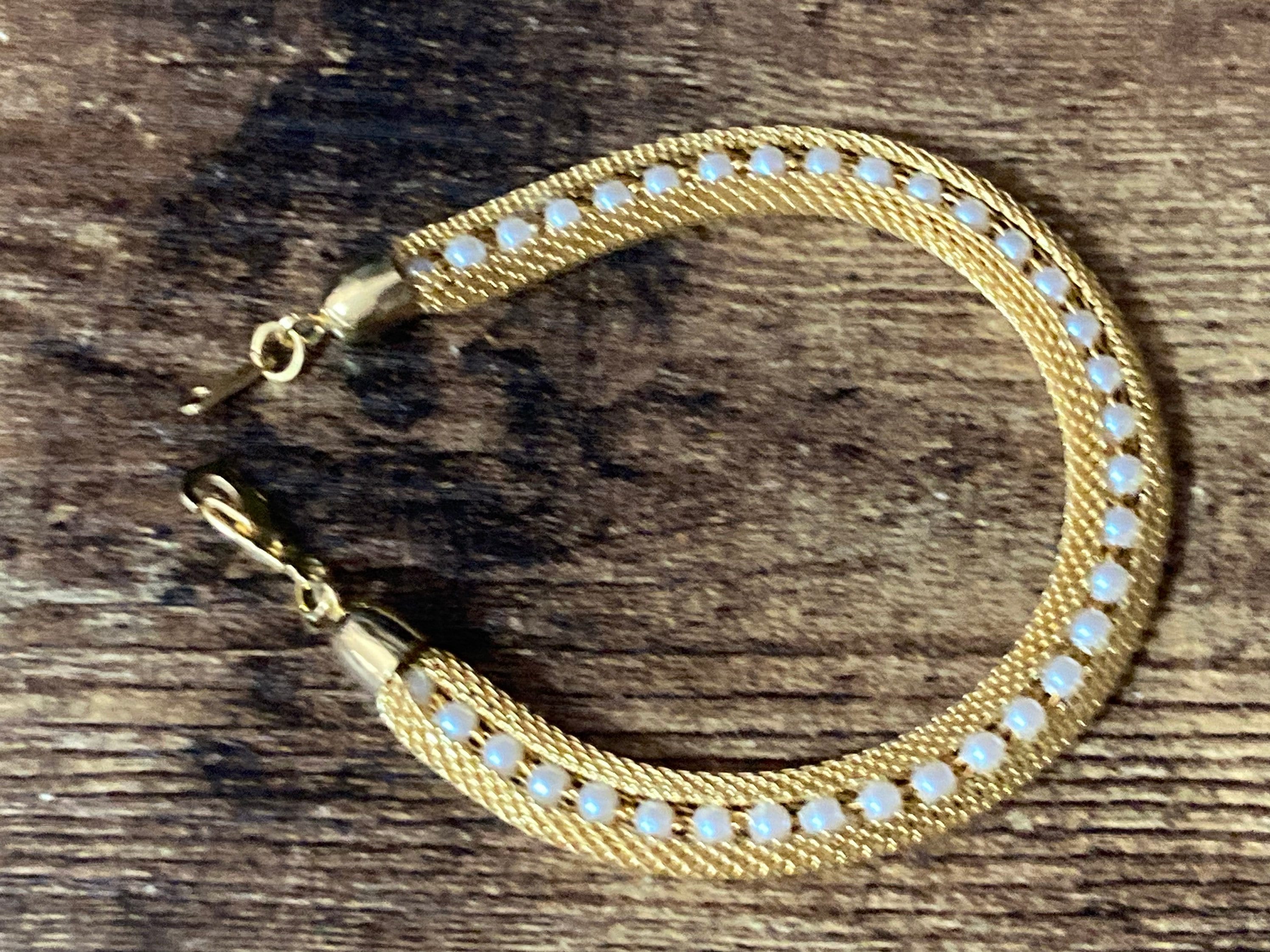 gold tone mesh cuff bracelet with faux pearl