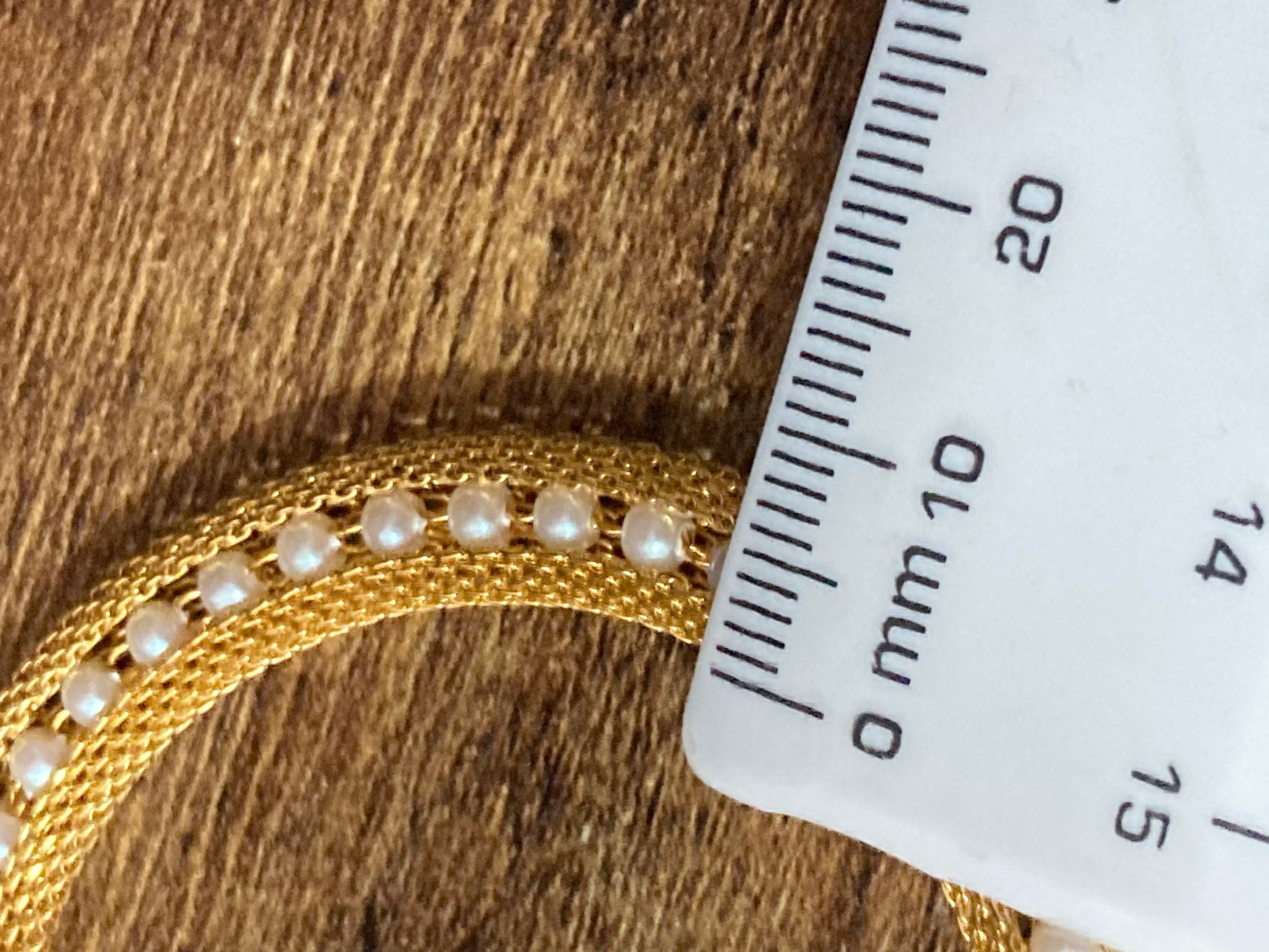 gold tone mesh cuff bracelet with faux pearl