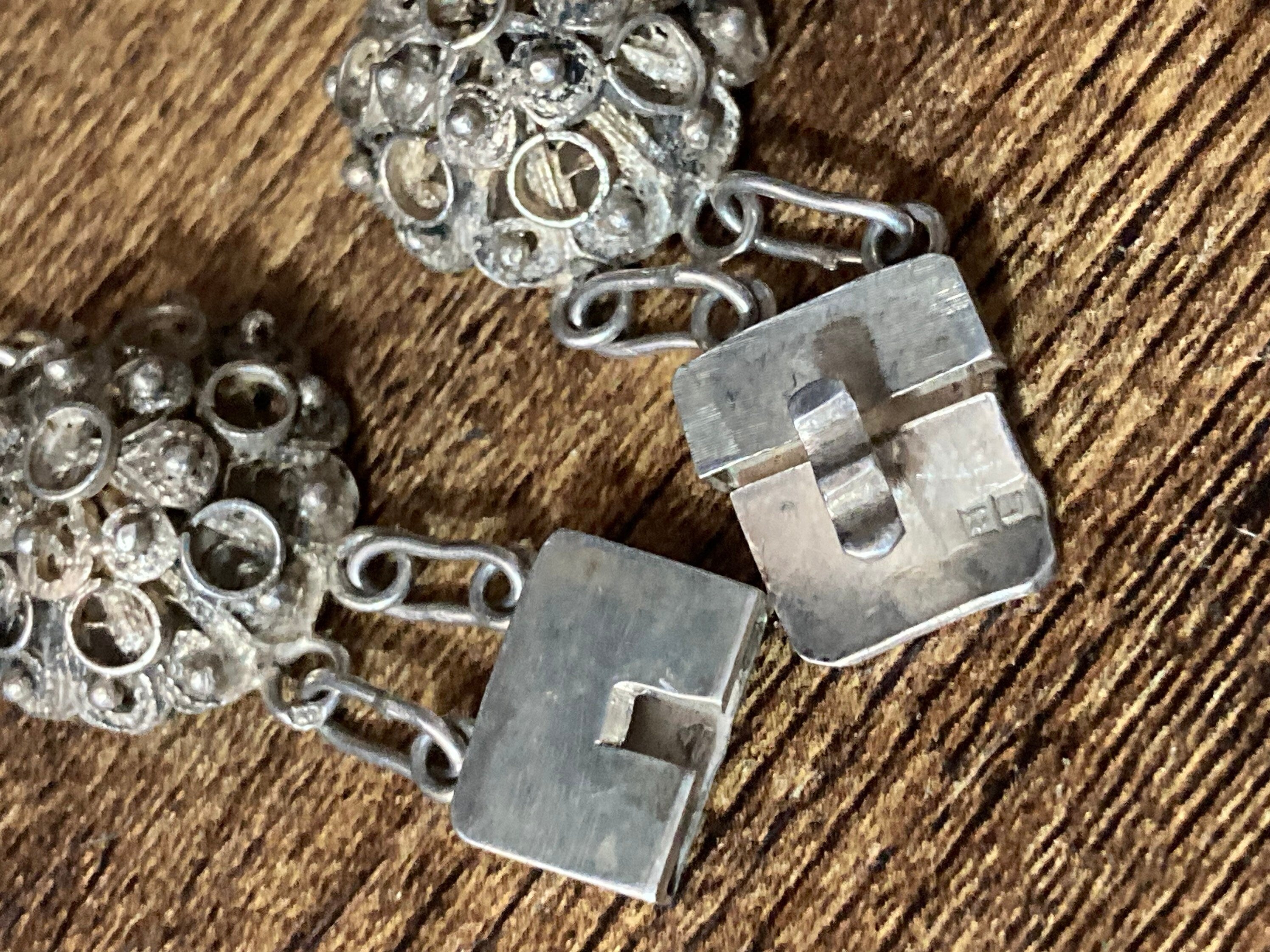 Continental Silver Etruscan filigree domed panel link bracelet