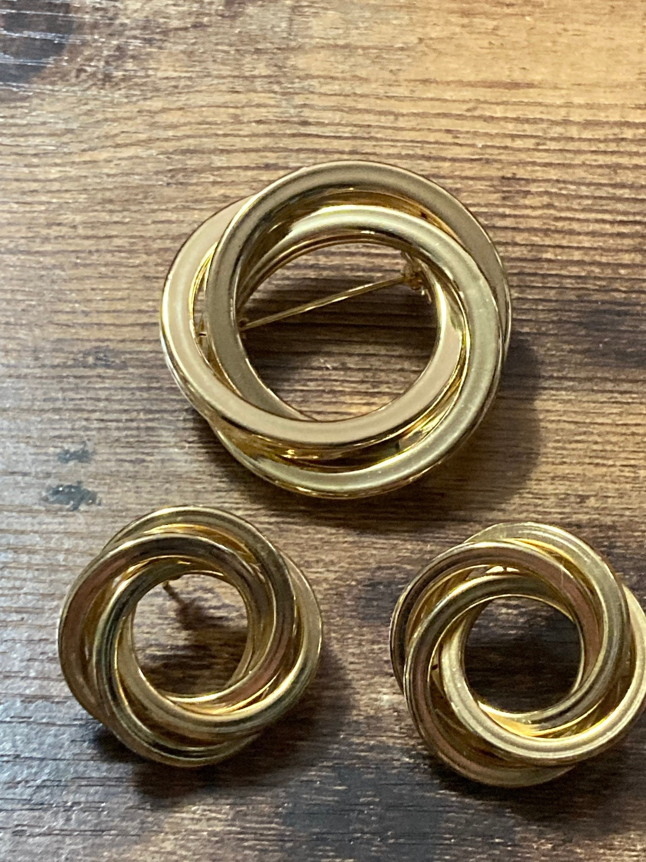 Vintage gold tone abstract round swirl brooch and matching pierced earrings set