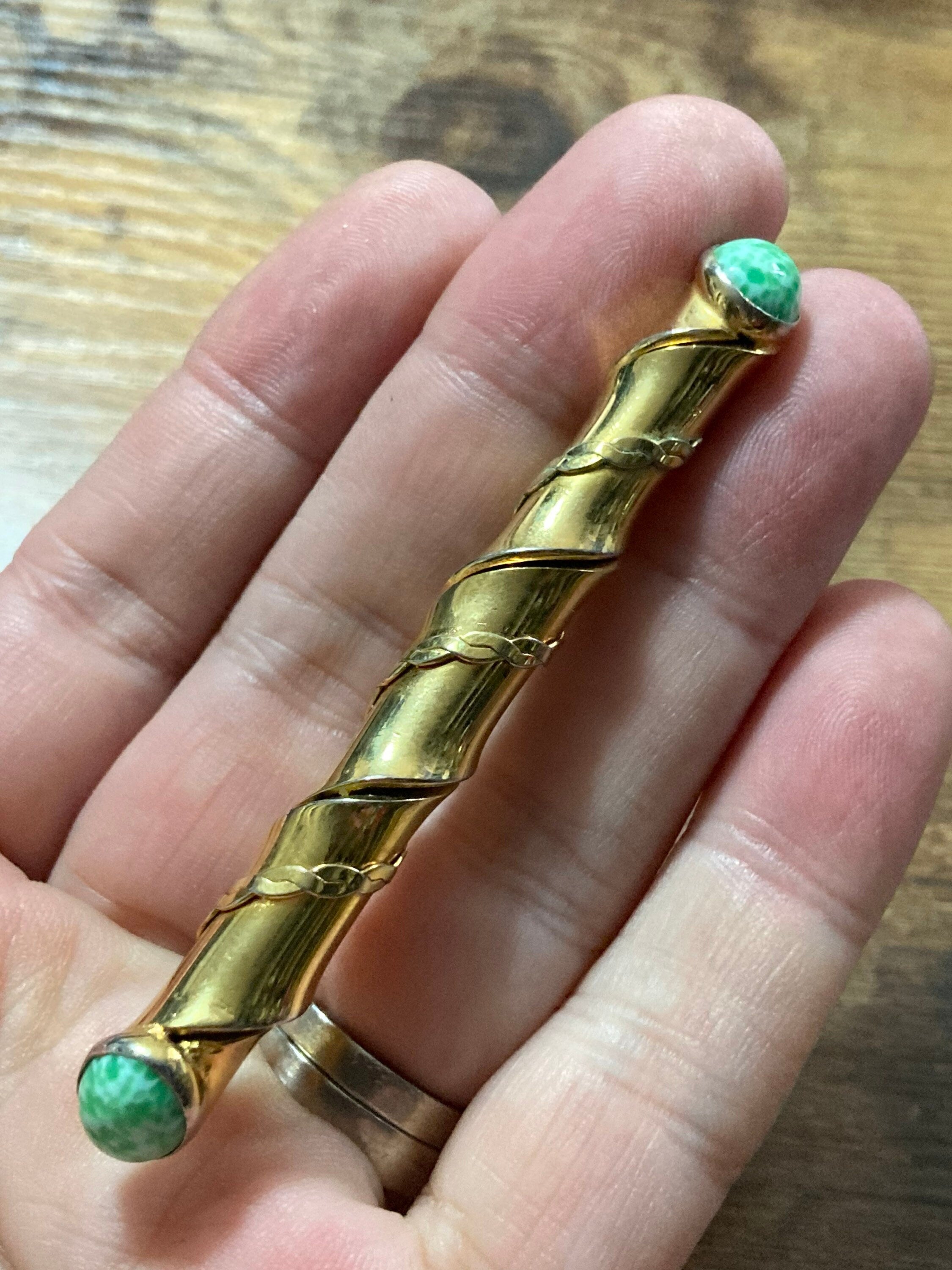 Long gold tone twisted bar Brooch with Peking Glass Ceramic green cabochons