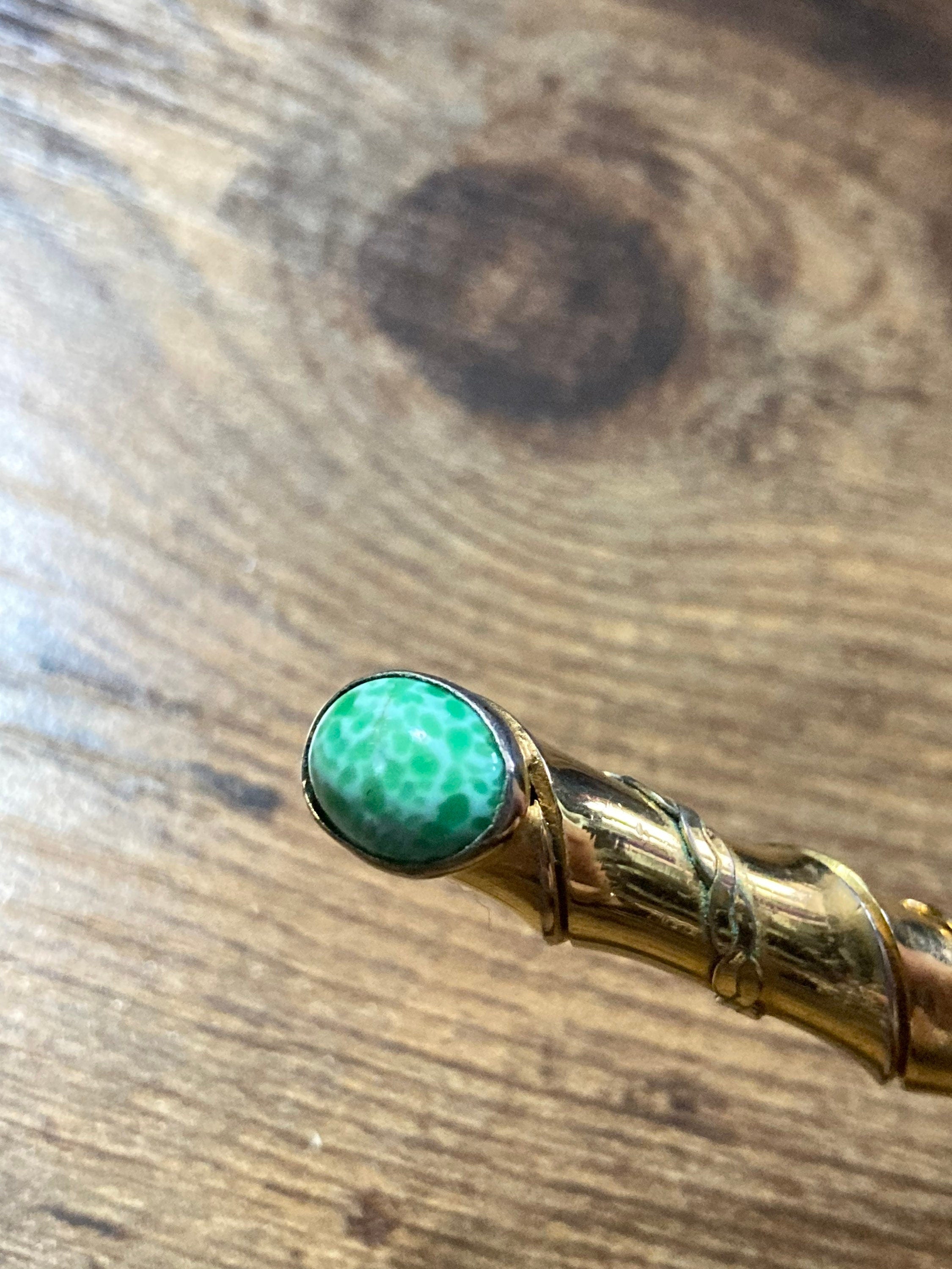 Long gold tone twisted bar Brooch with Peking Glass Ceramic green cabochons