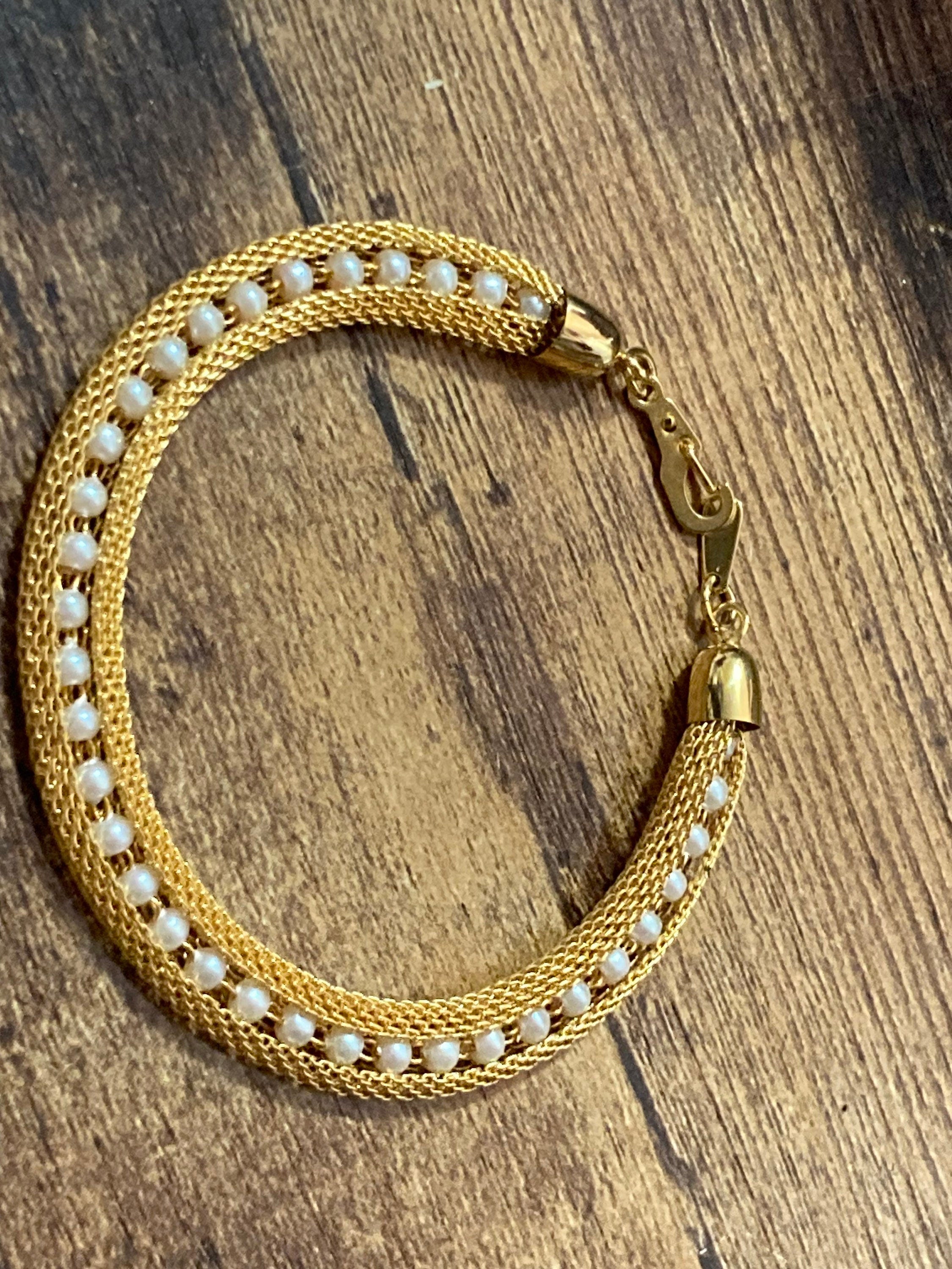 gold tone mesh cuff bracelet with faux pearl
