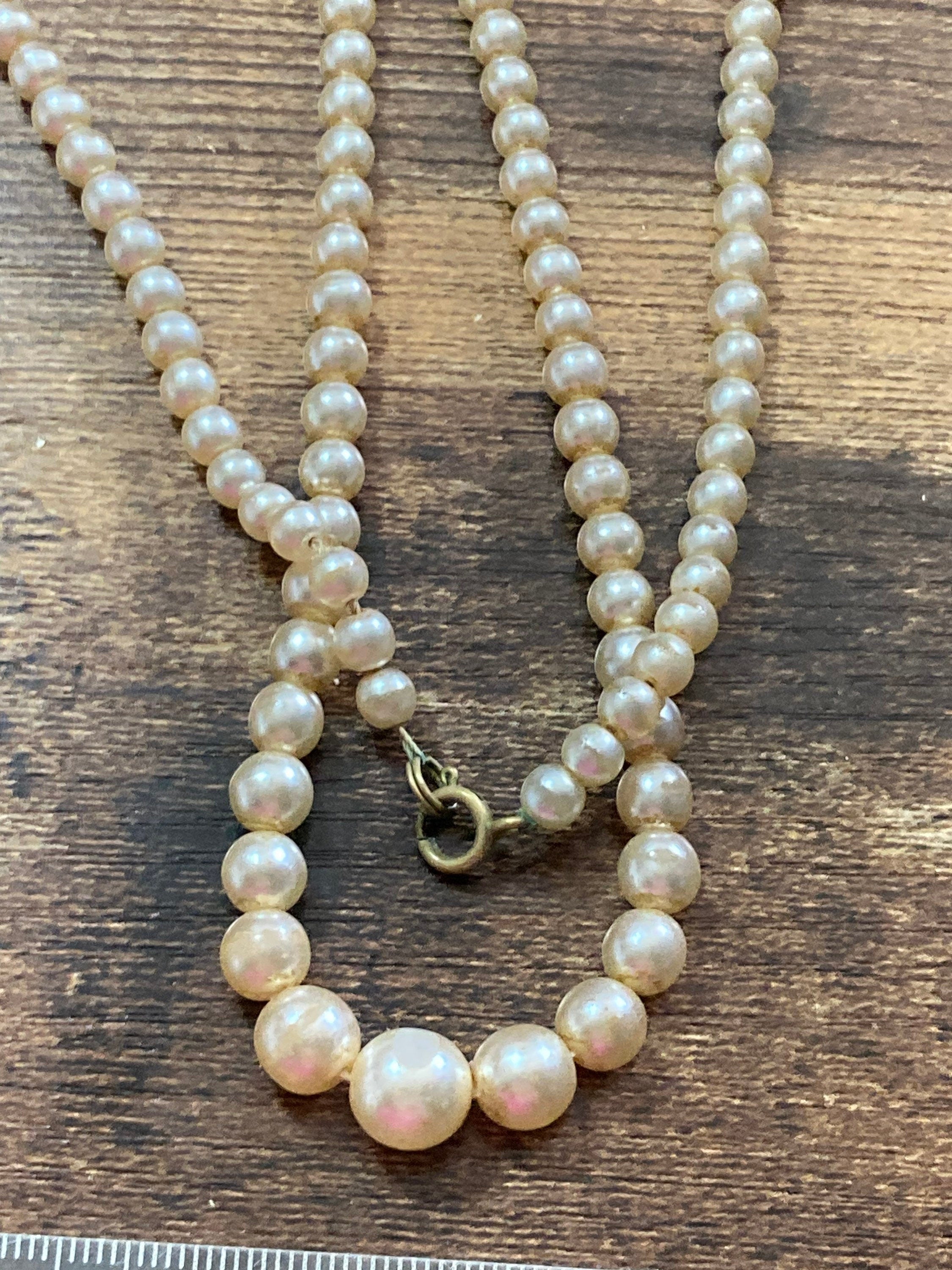 Graduated cream glass faux individually knotted pearl necklace medium length 64cm