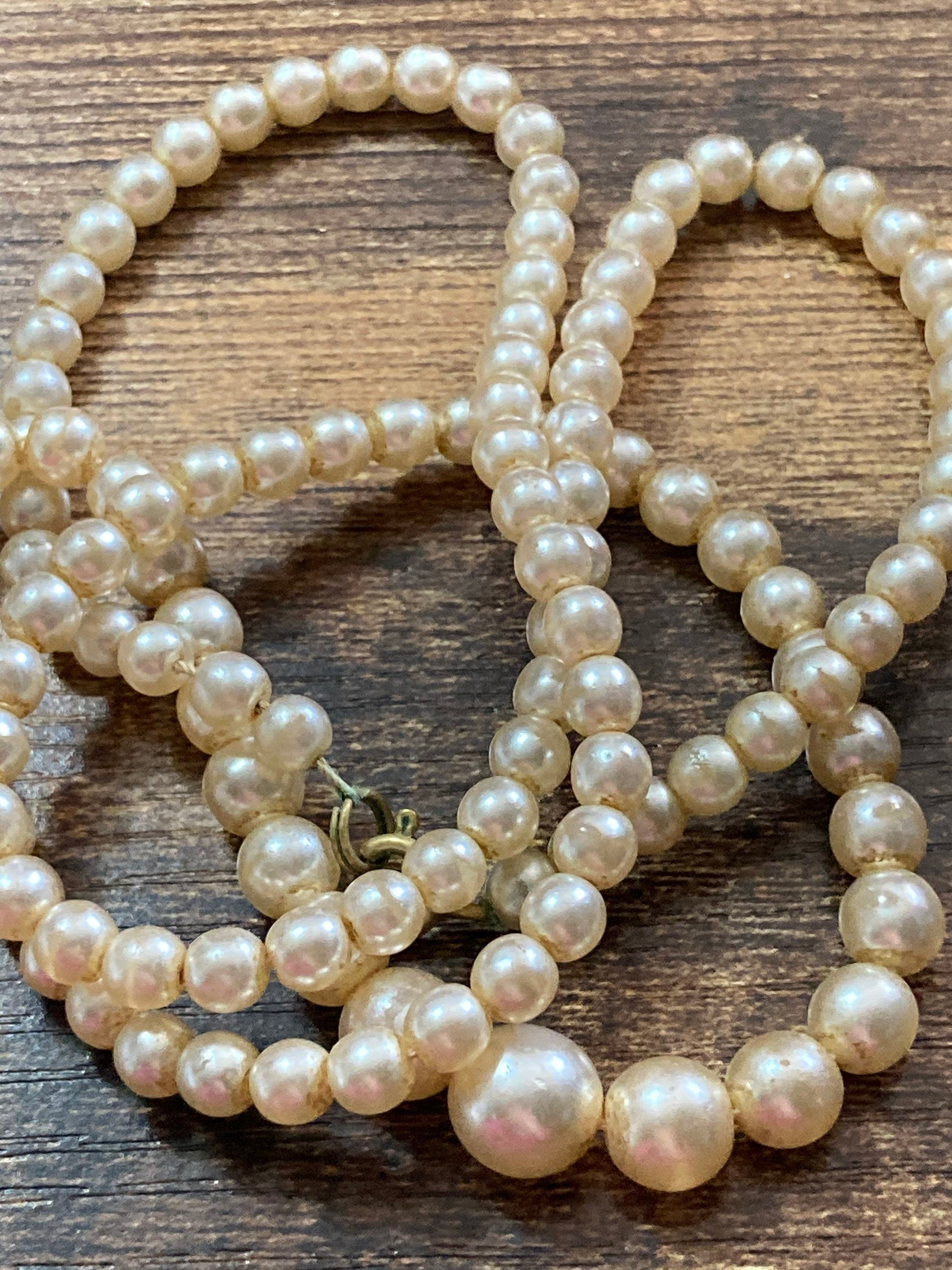 Graduated cream glass faux individually knotted pearl necklace medium length 64cm