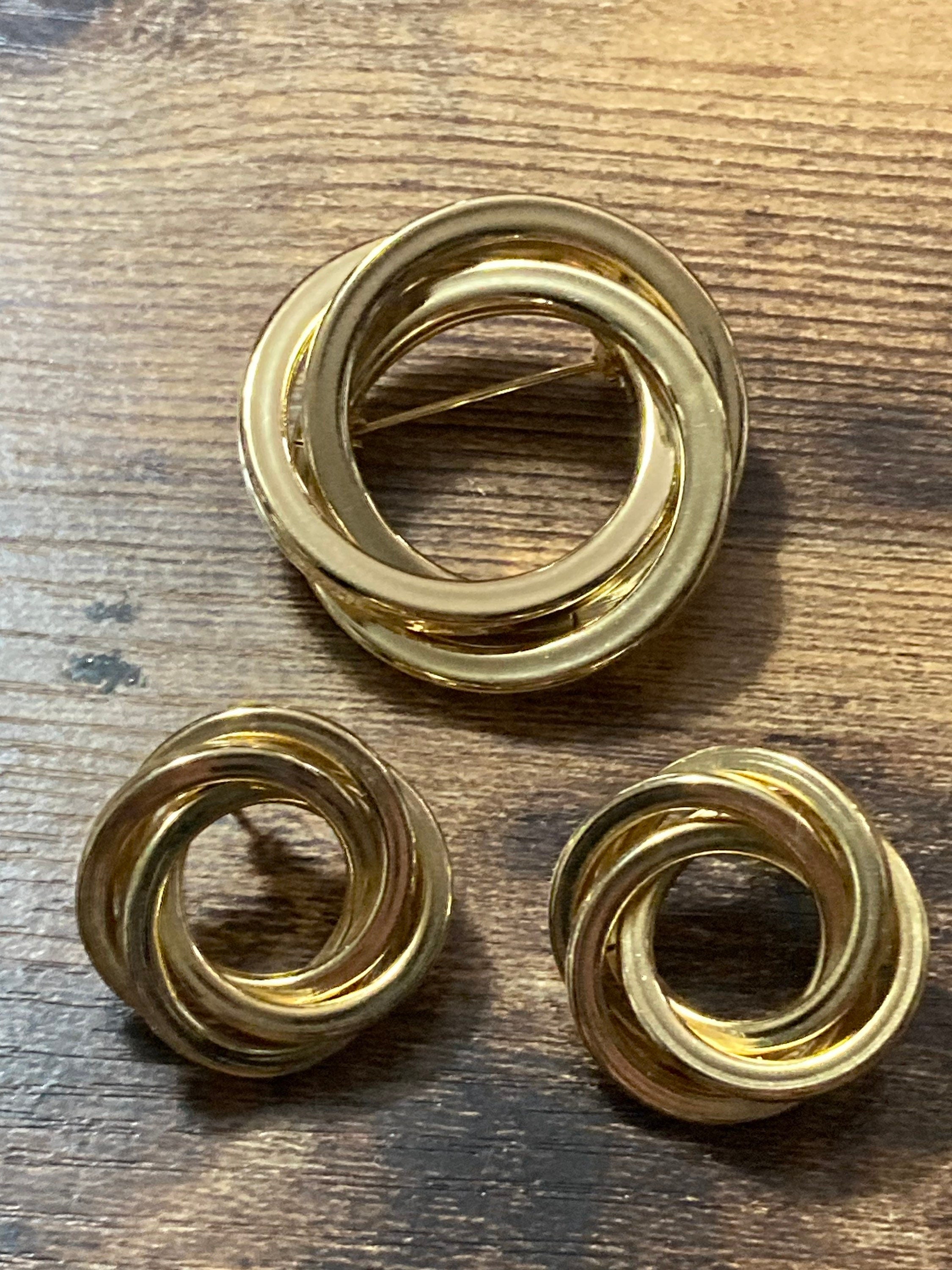 Vintage gold tone abstract round swirl brooch and matching pierced earrings set