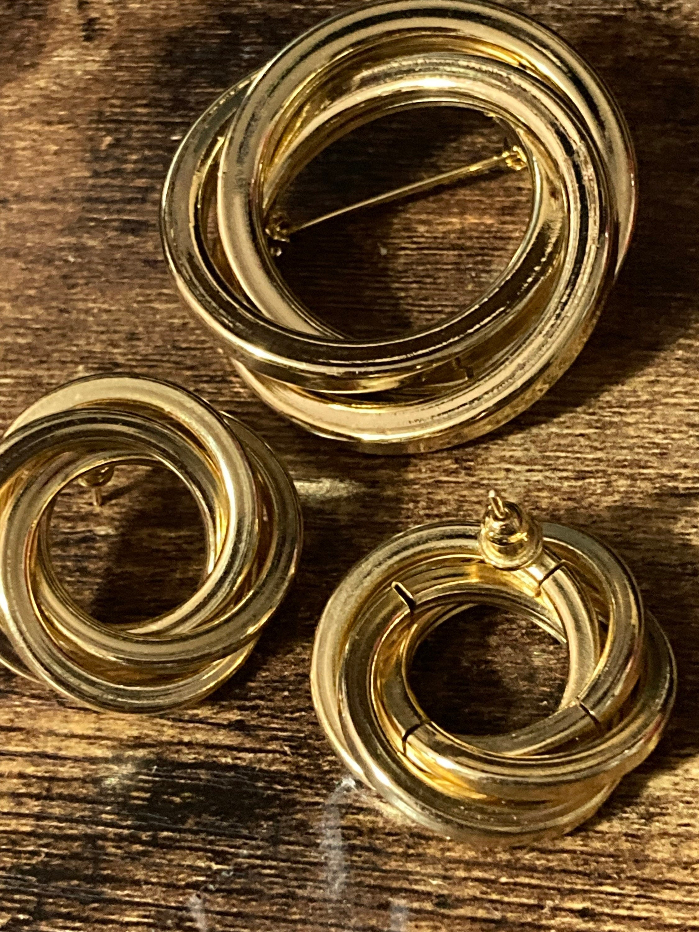 Vintage gold tone abstract round swirl brooch and matching pierced earrings set