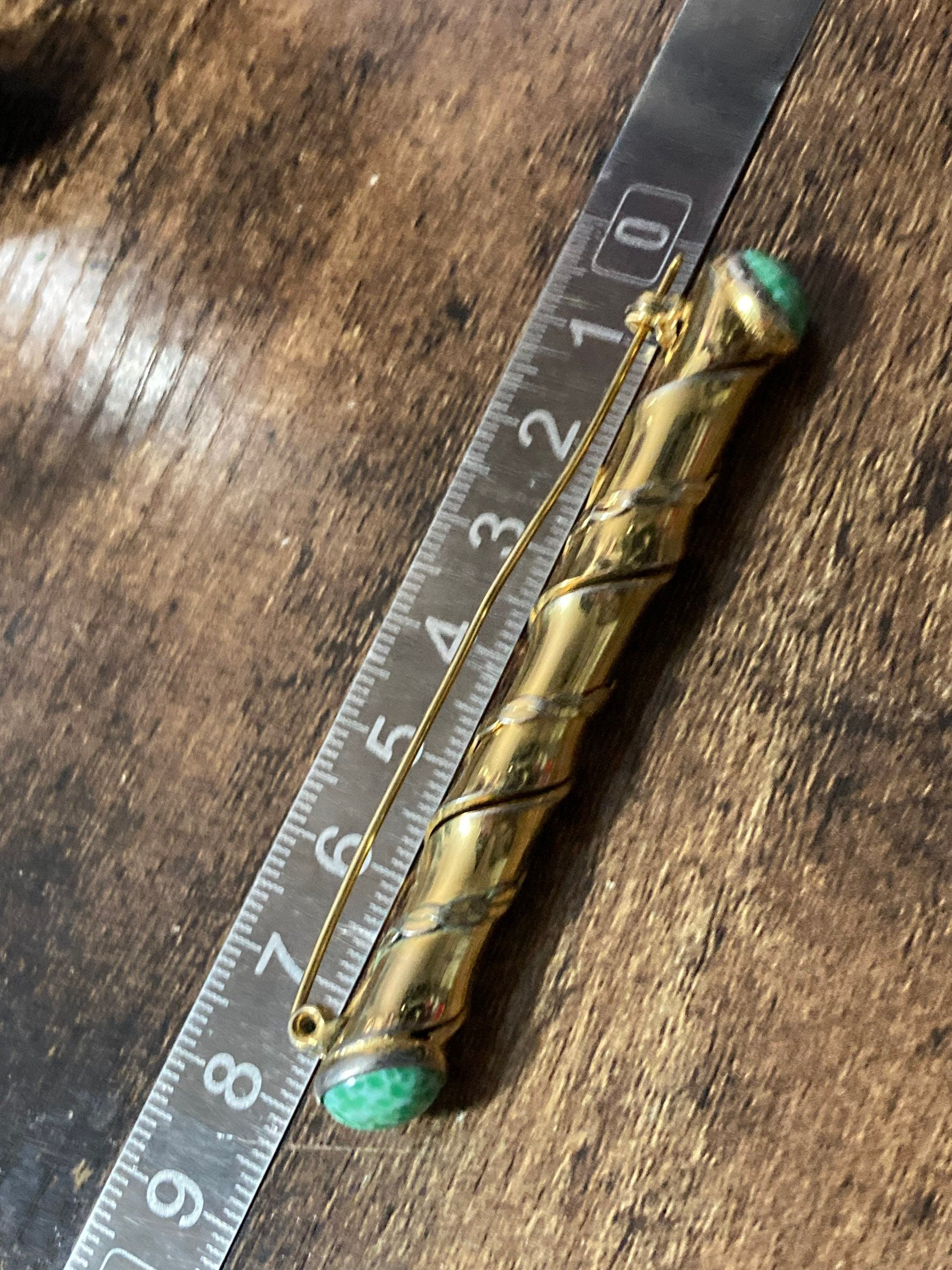 Long gold tone twisted bar Brooch with Peking Glass Ceramic green cabochons