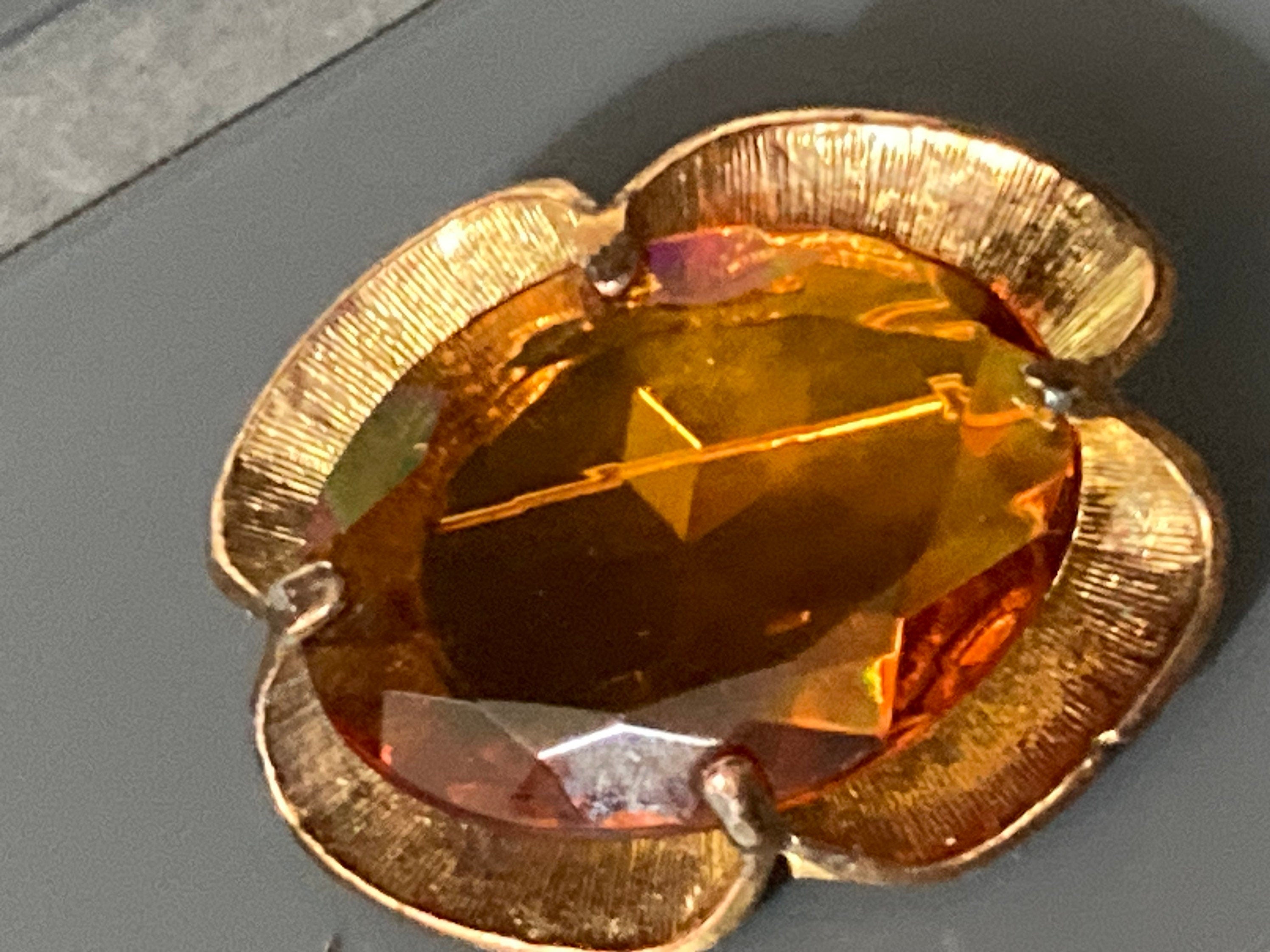 Vintage large brooch with brown amber glass faceted central cabochon
