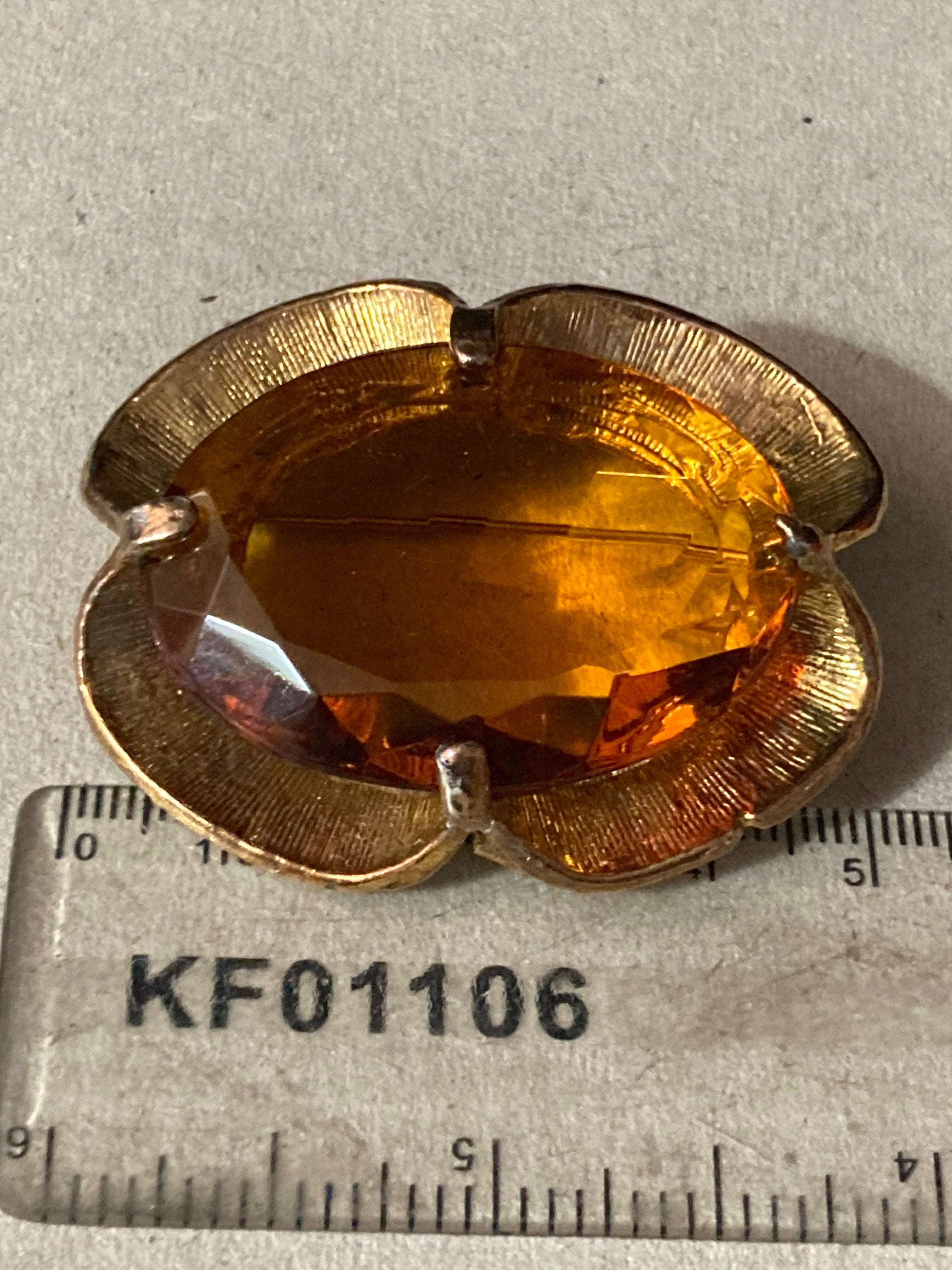 Vintage large brooch with brown amber glass faceted central cabochon