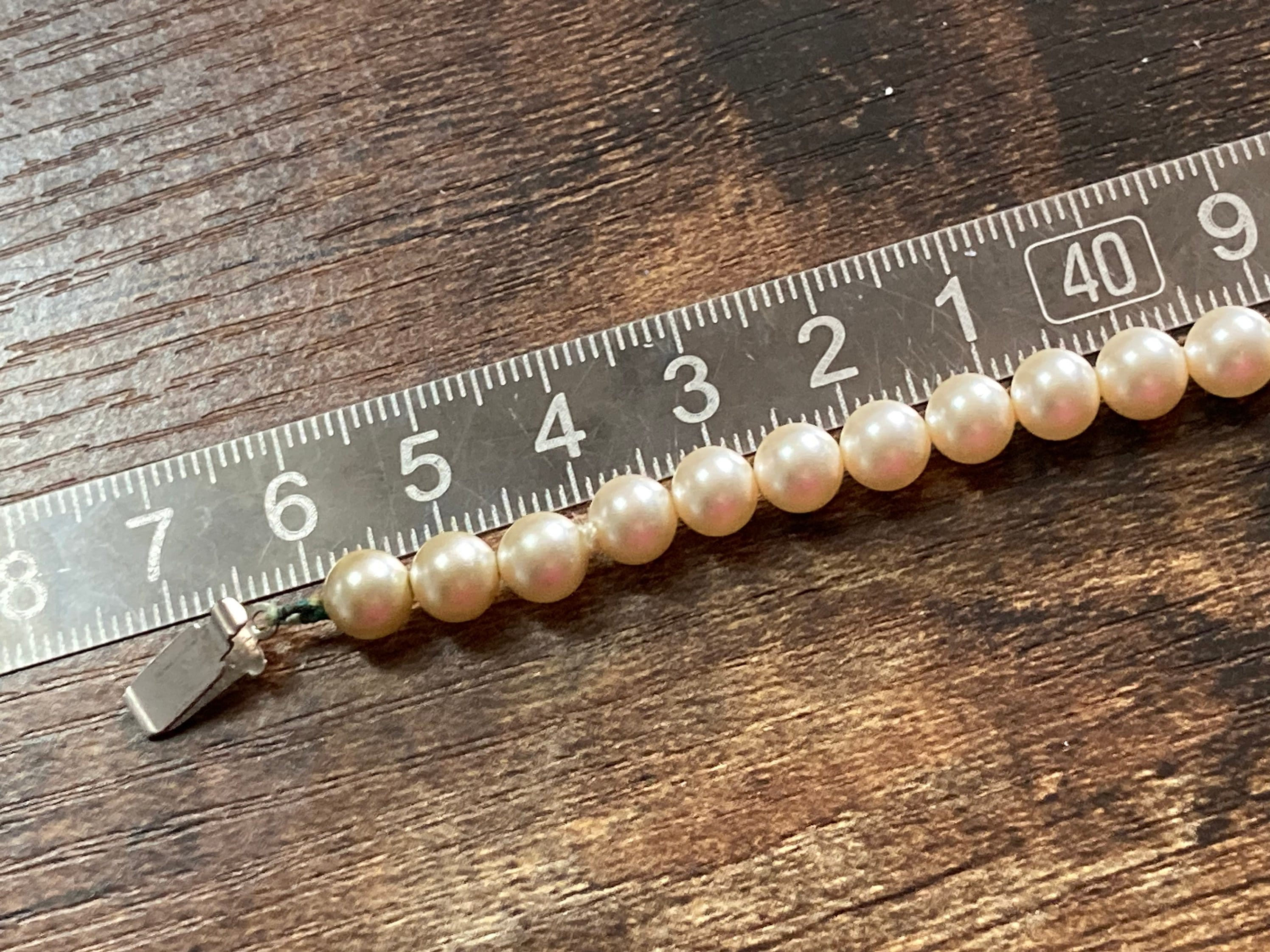 cream glass faux individually knotted pearl necklace medium length 47cm