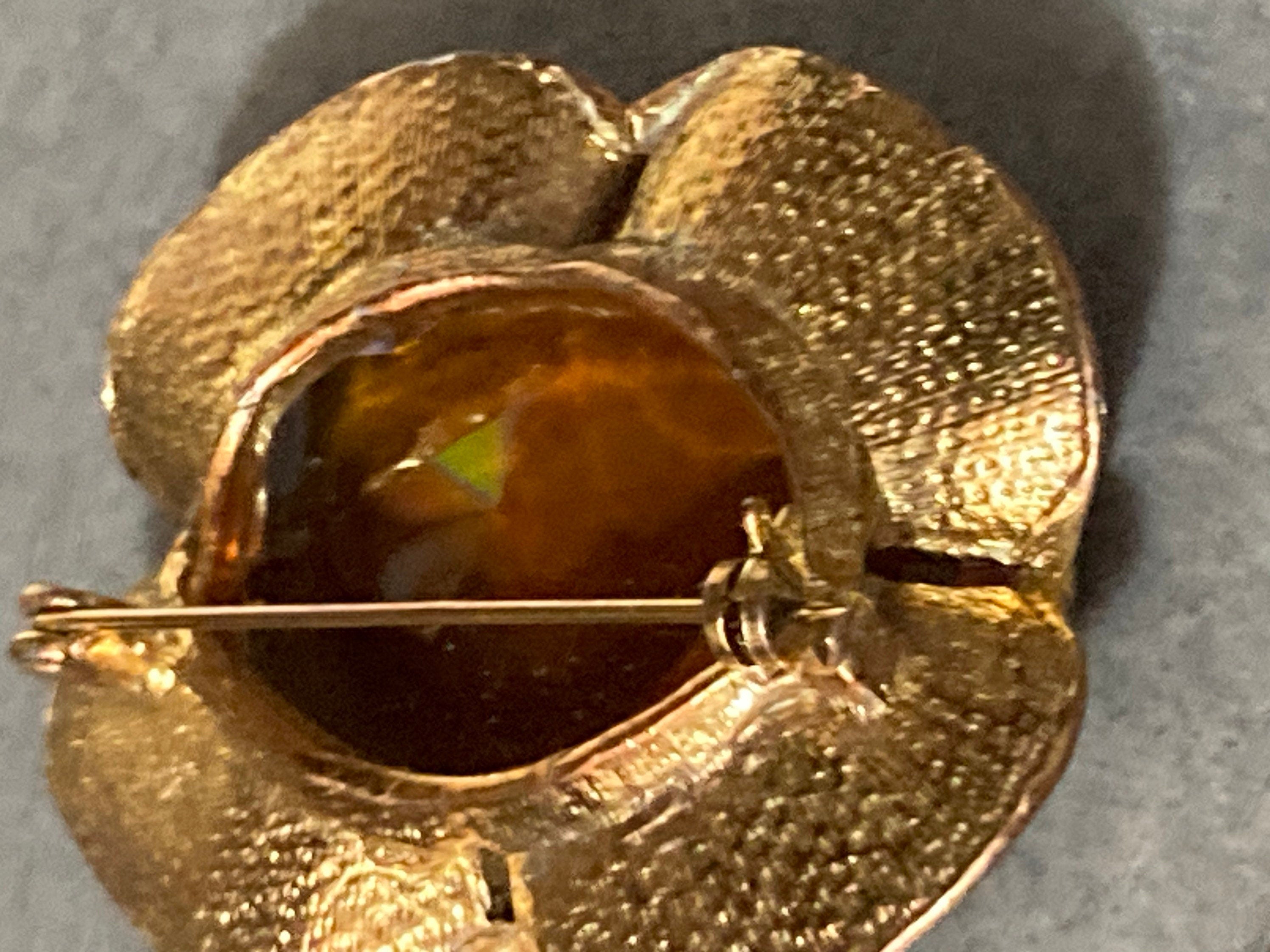 Vintage large brooch with brown amber glass faceted central cabochon