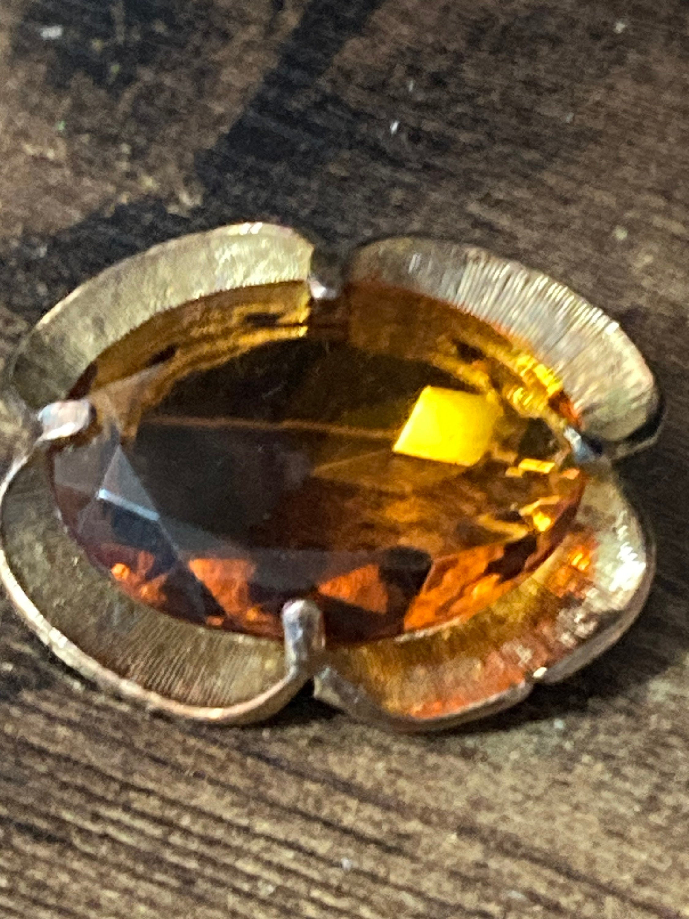 Vintage large brooch with brown amber glass faceted central cabochon