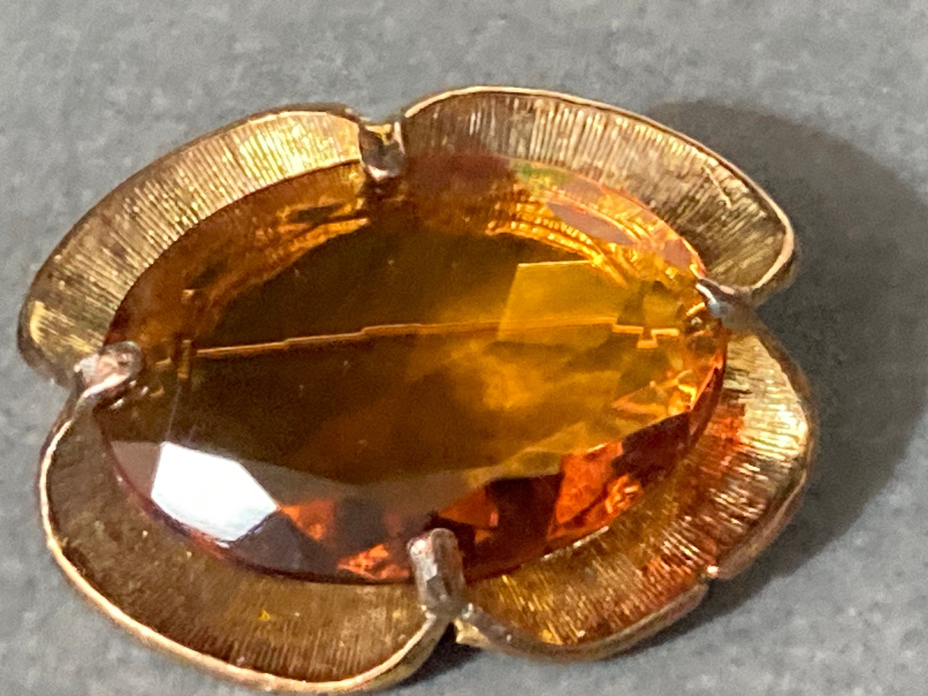 Vintage large brooch with brown amber glass faceted central cabochon