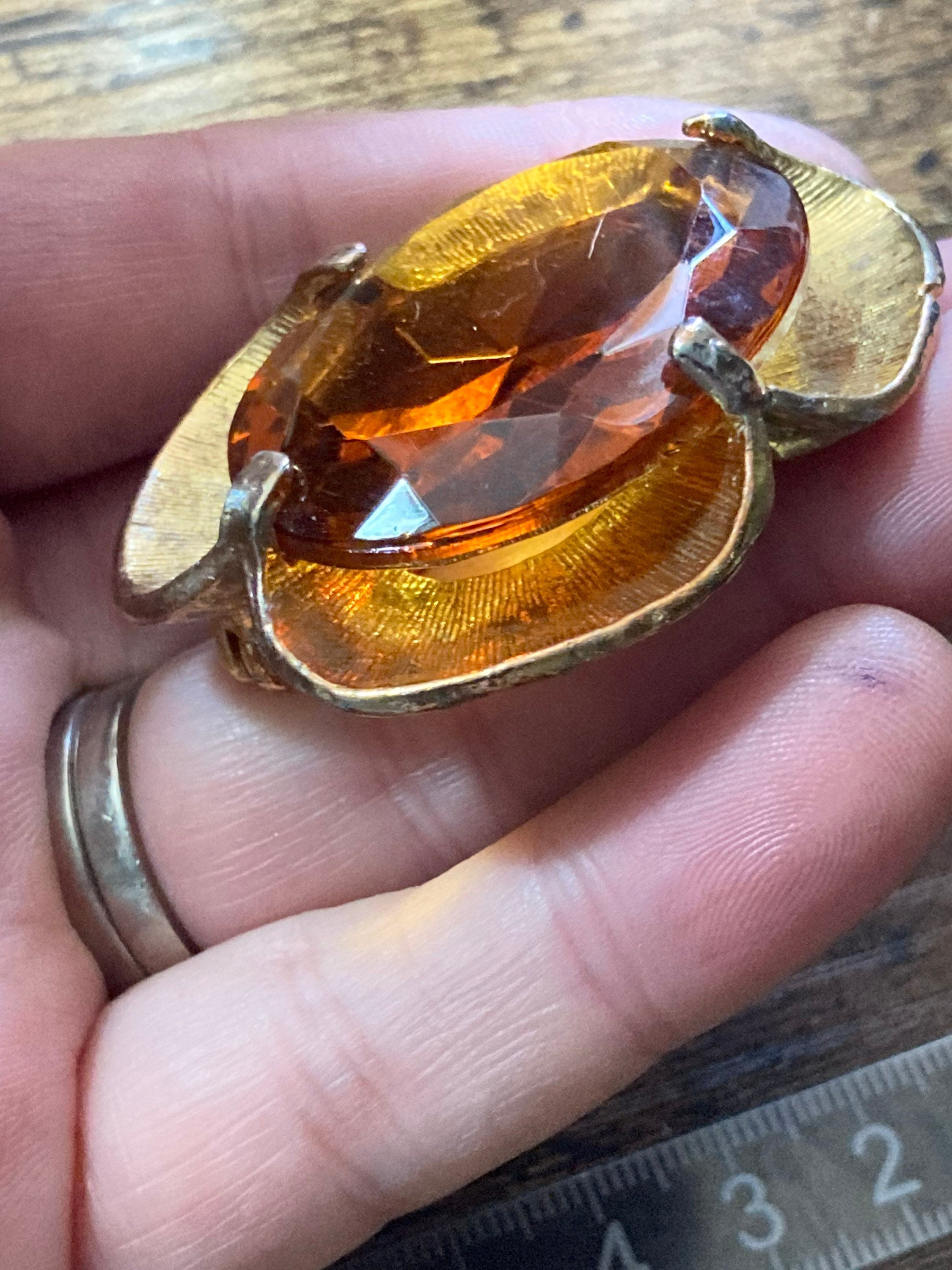 Vintage large brooch with brown amber glass faceted central cabochon