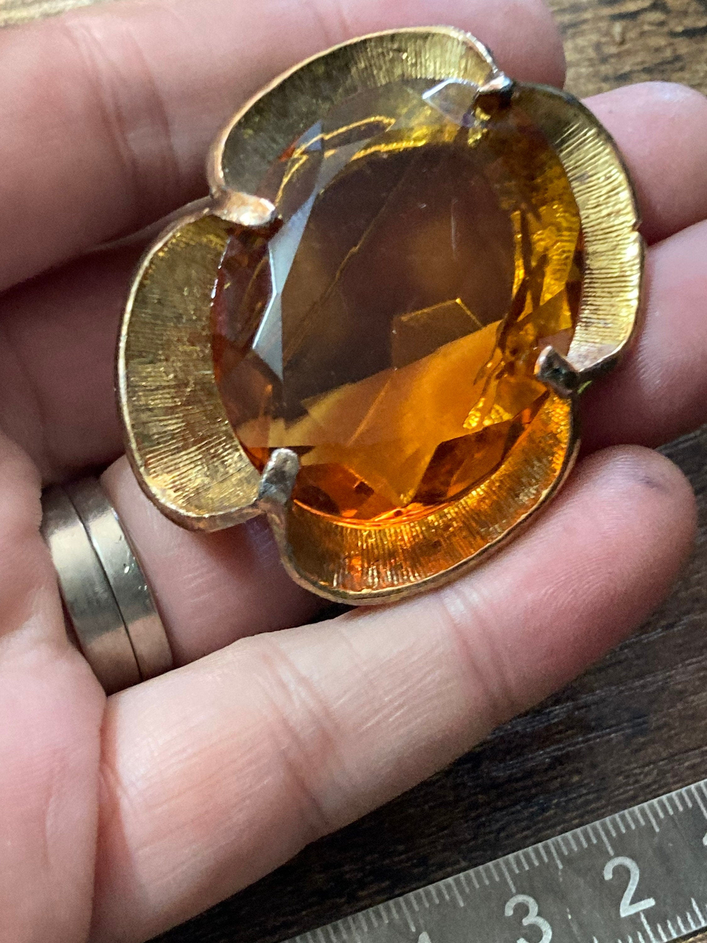 Vintage large brooch with brown amber glass faceted central cabochon