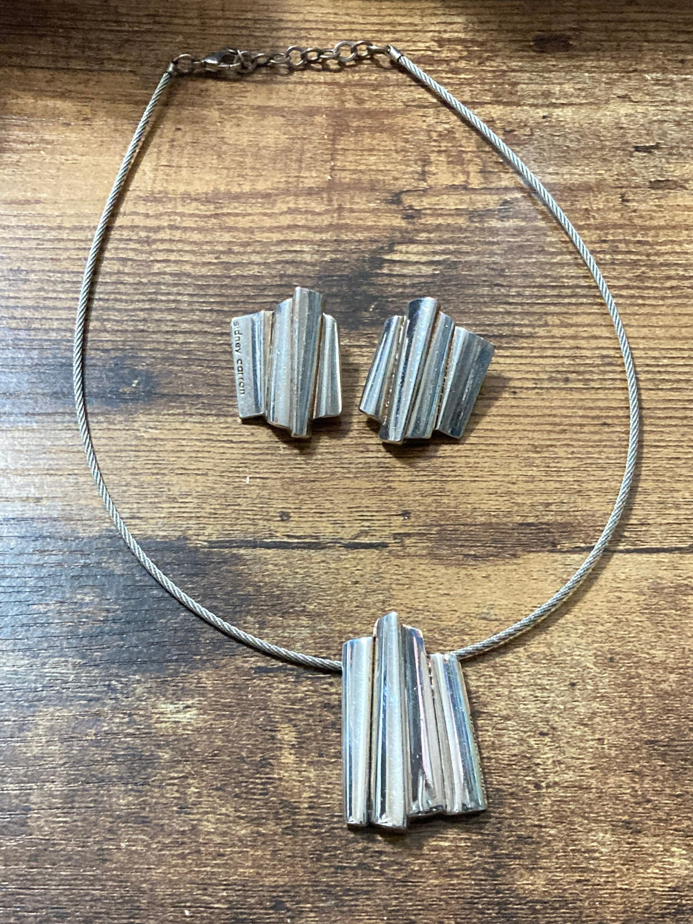 Signed Sidney Carron silver iconic abstract pendant necklace and clip on earrings French designer