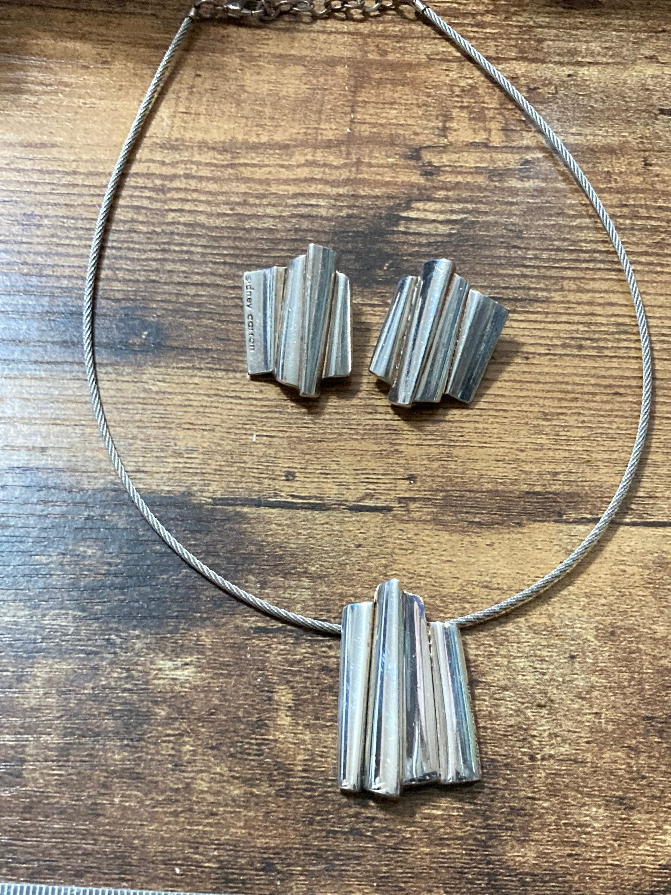 Signed Sidney Carron silver iconic abstract pendant necklace and clip on earrings French designer
