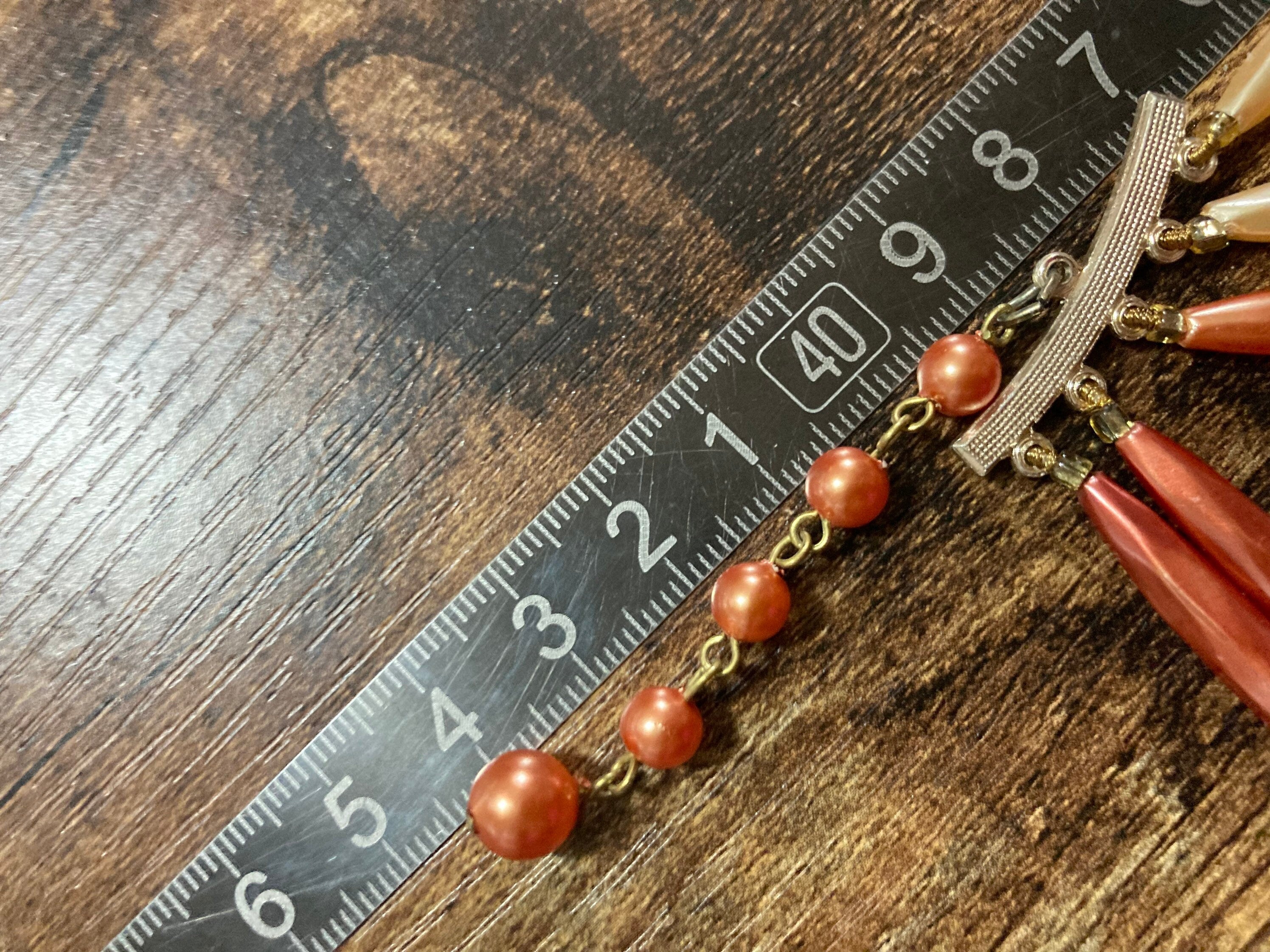 Mid century orange peach pink faux pearl plastic beaded multi strand choker necklace