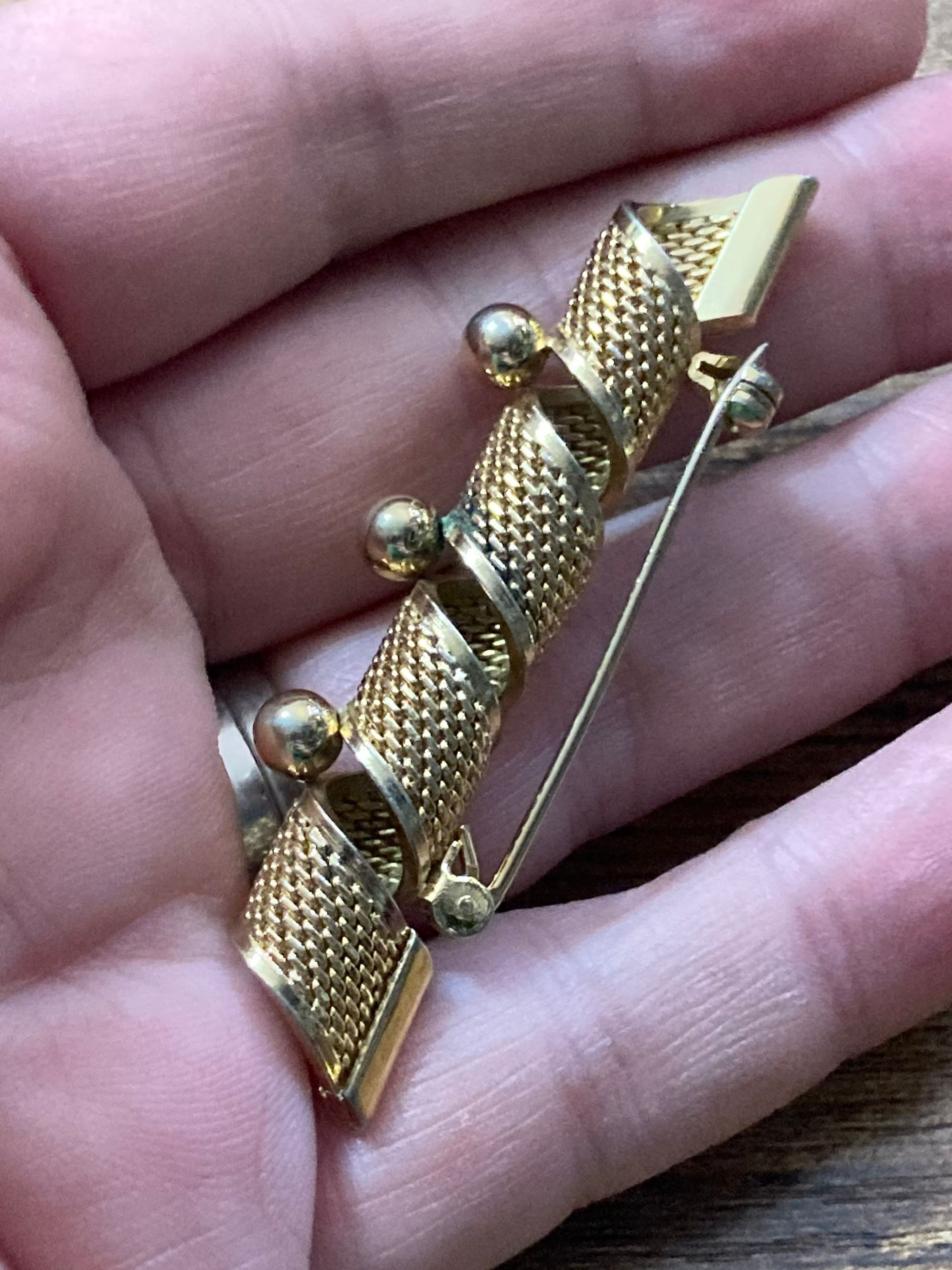 gold tone modernist filigree bar brooch with balls 6cm long