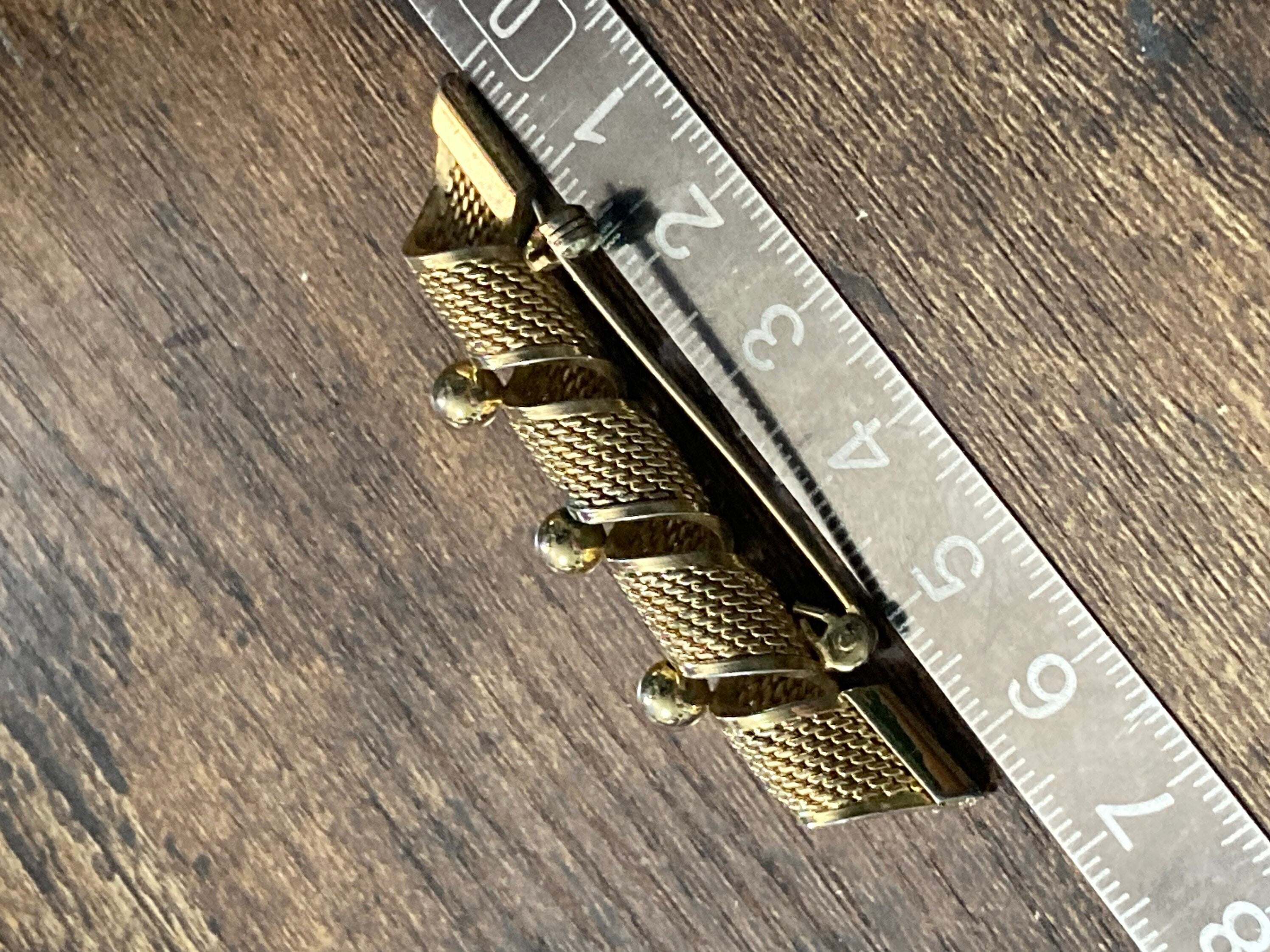 gold tone modernist filigree bar brooch with balls 6cm long