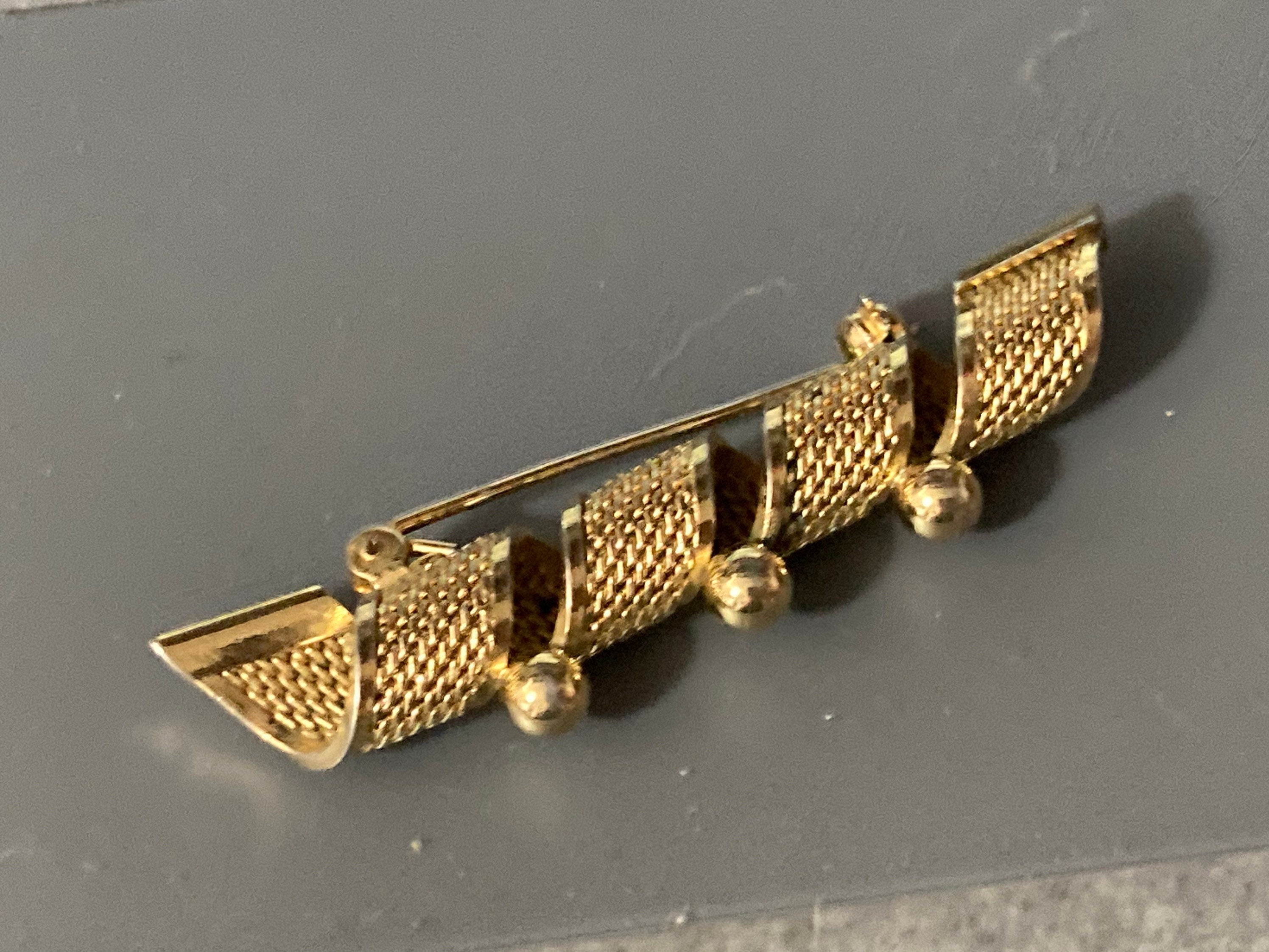 gold tone modernist filigree bar brooch with balls 6cm long