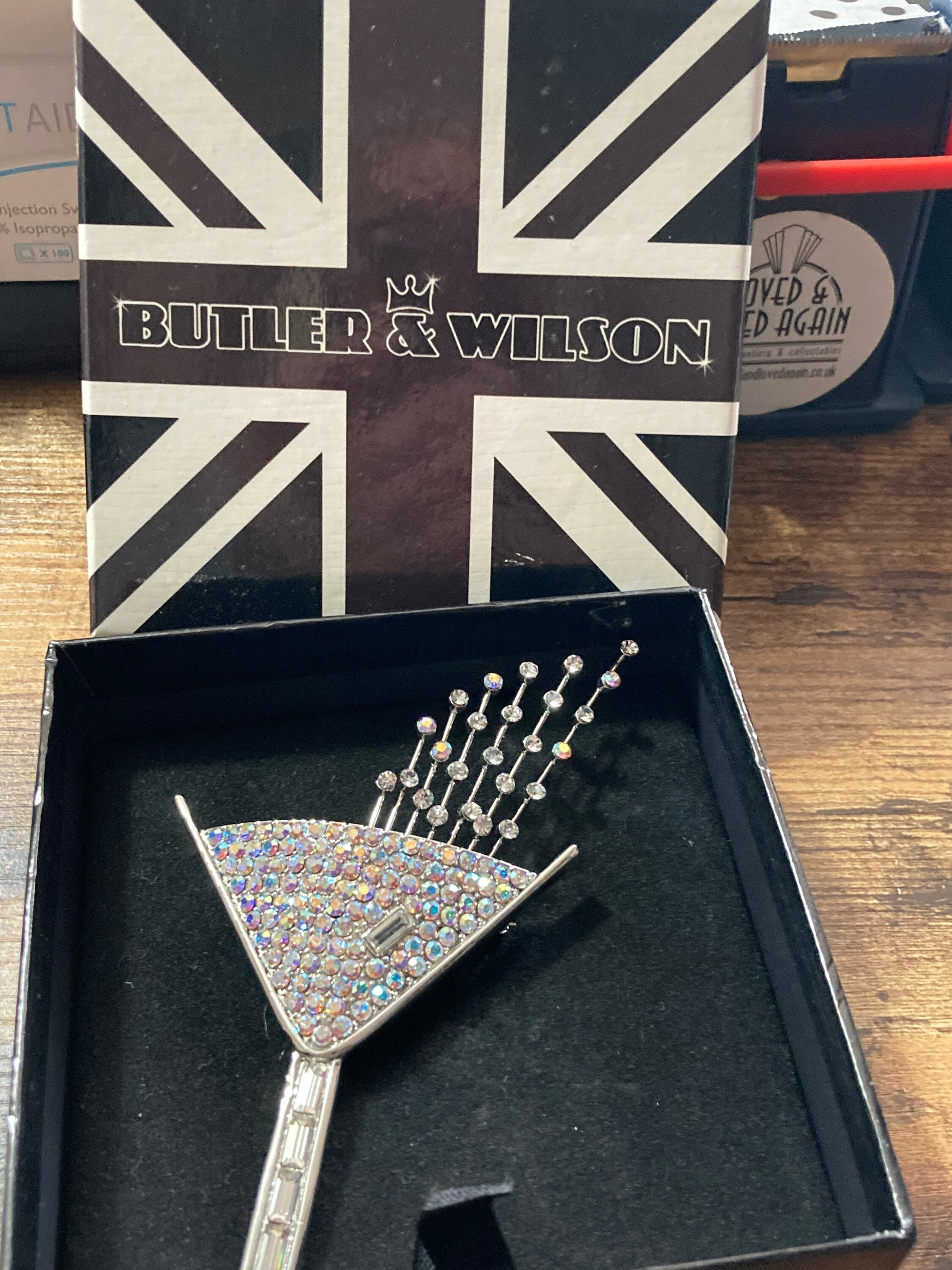 Signed butler and Wilson clear diamanté champagne cocktail glass brooch