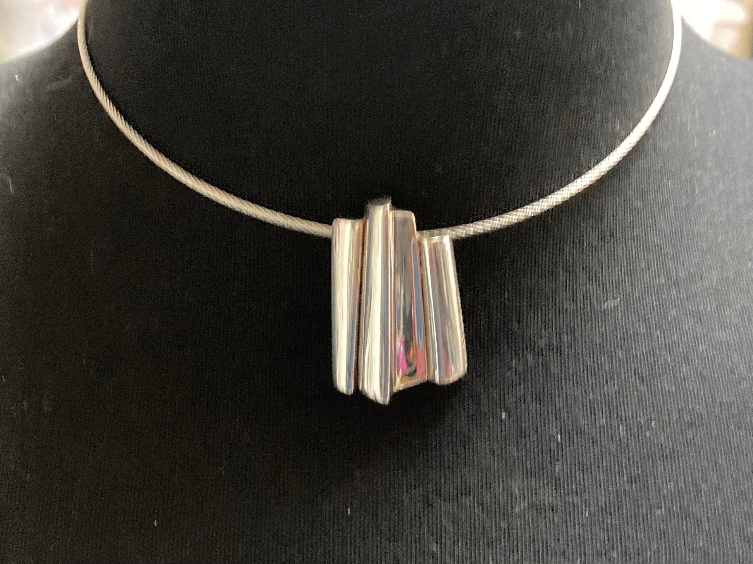 Signed Sidney Carron silver iconic abstract pendant necklace and clip on earrings French designer