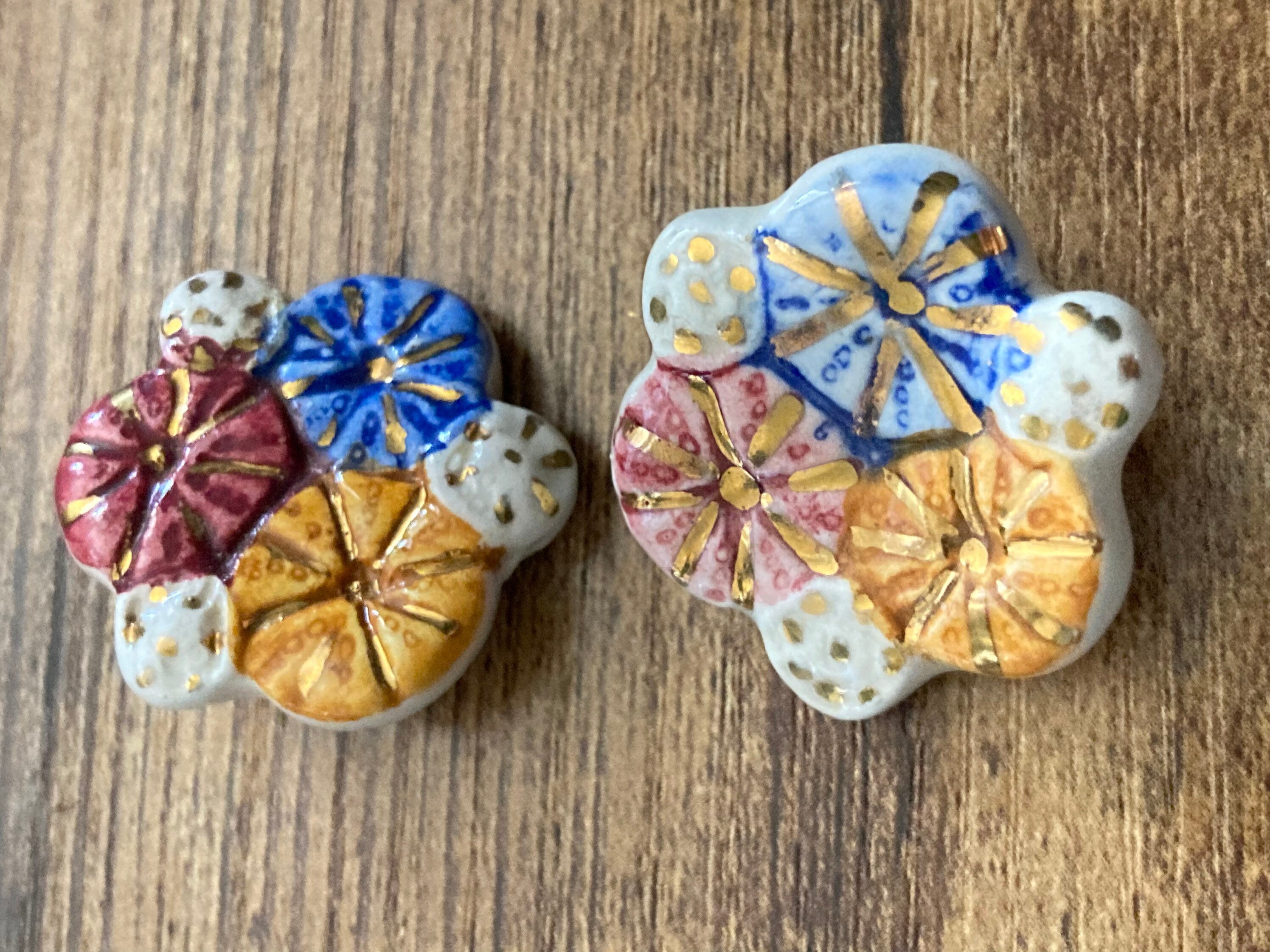 Artisan ceramic pink orange blue glazed floral clip on earrings