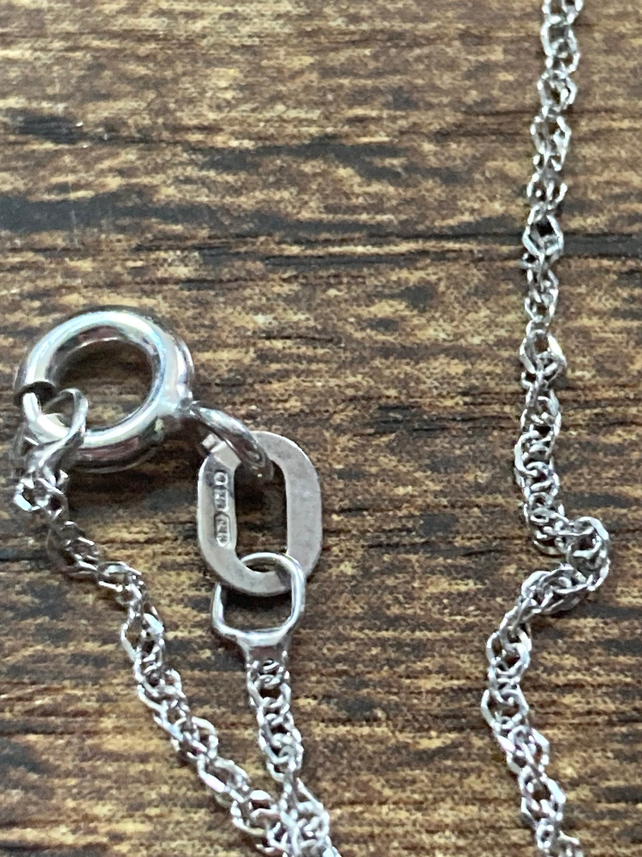 Vintage 1976 signed Givenchy gold tone pendant on 9ct white gold fine chain