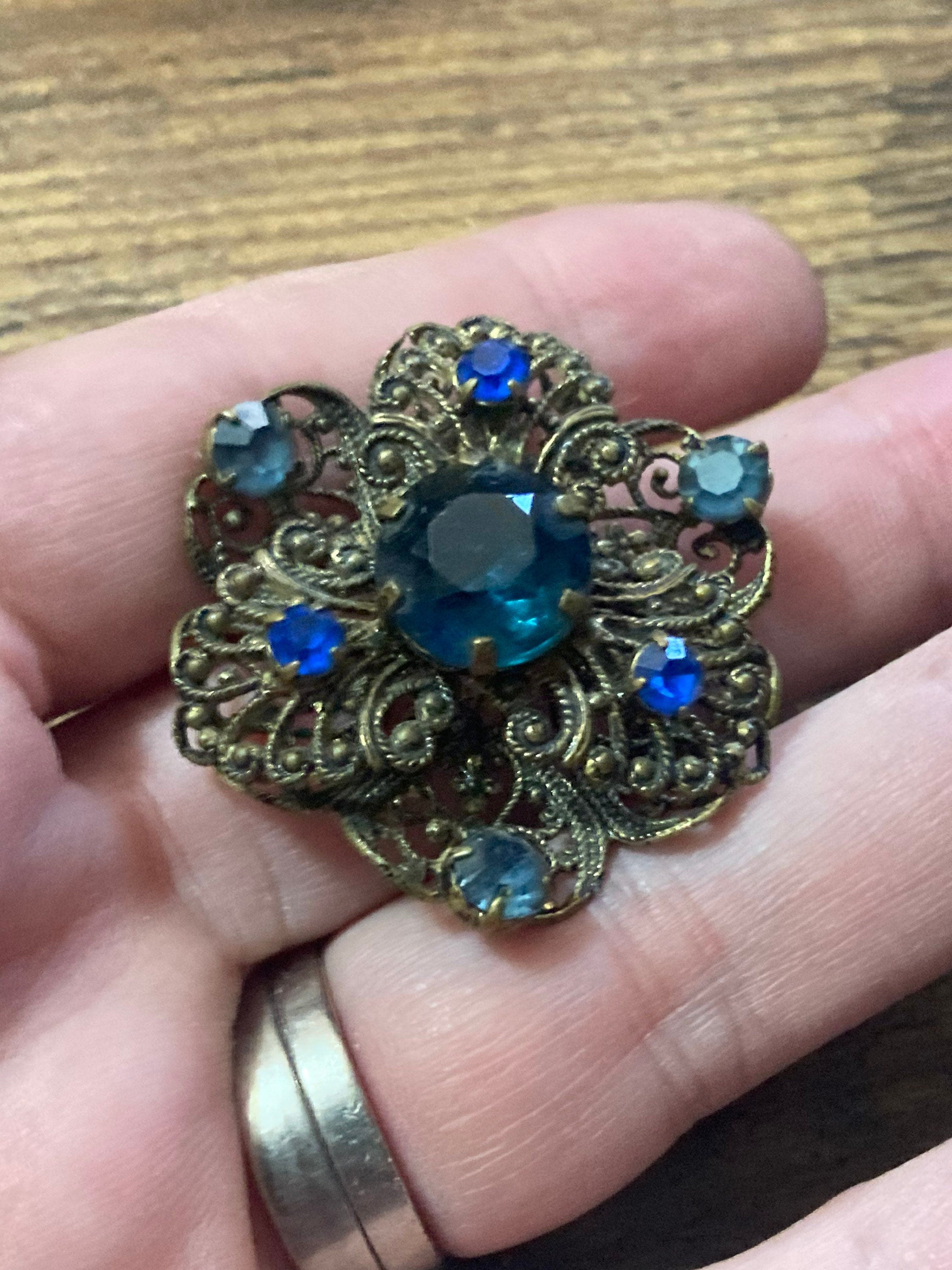 vintage Czech brass filigree sapphire blue rhinestone diamanté brooch